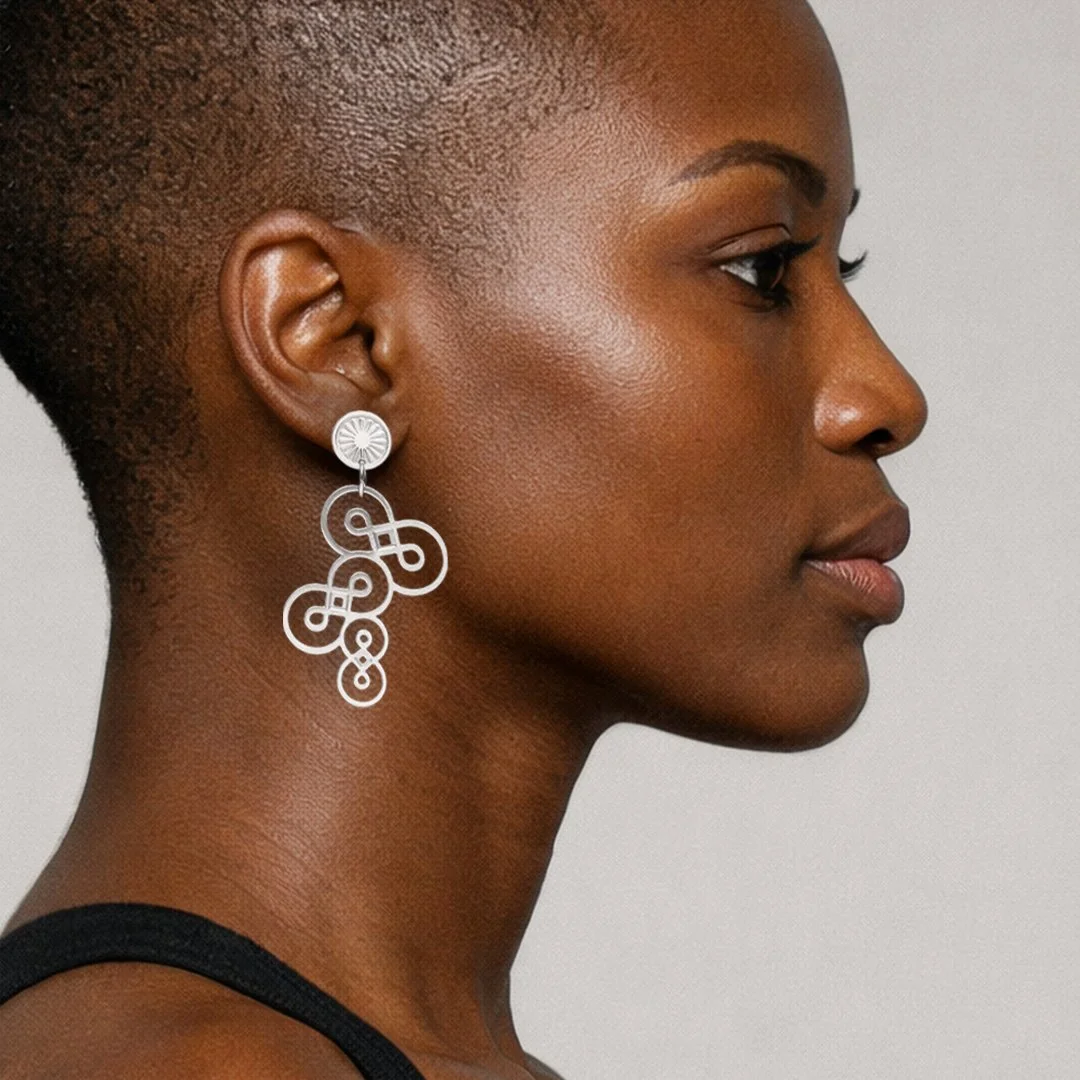 026-03-02-WINGED INFINITY-ZILVER-VIERKANT.jpg