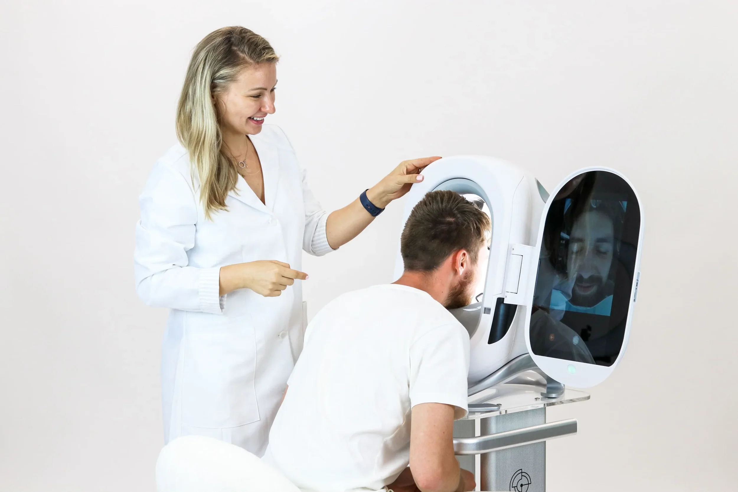 gentlemen getting his skin analyzed