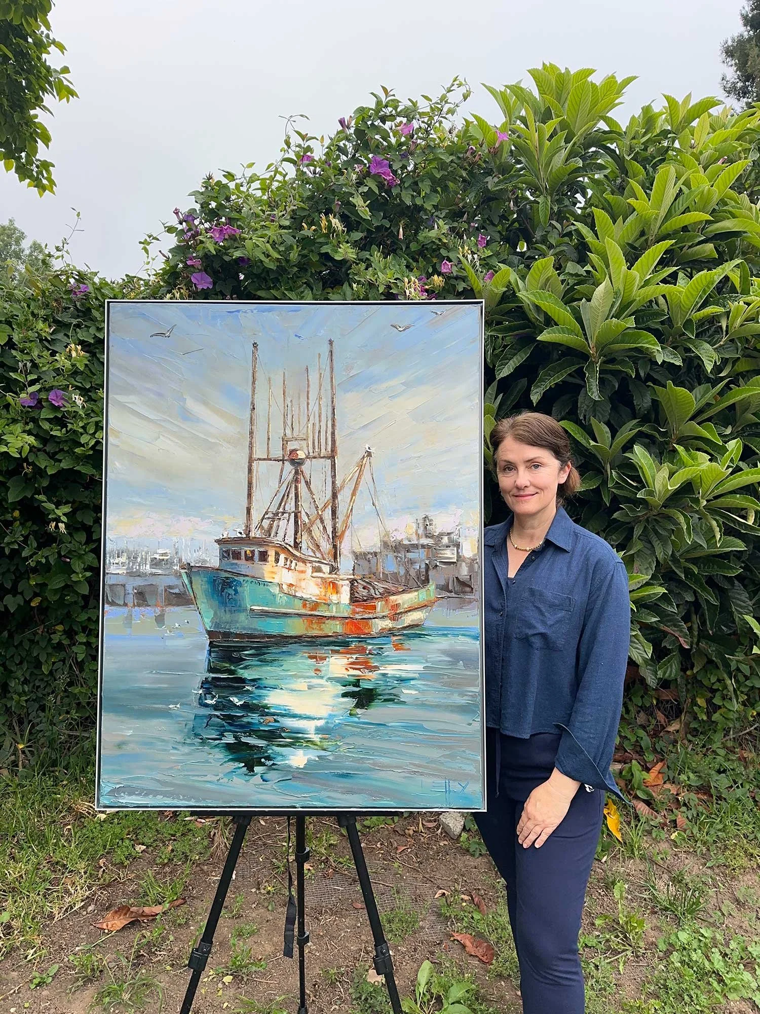 Harbor Patina original oil painting of a weathered fishing boat with rust tones and teal hull, reflected in calm harbor water with masts and industrial waterfront in the background