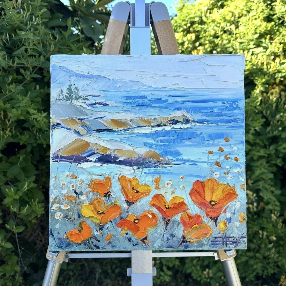 impasto coastal painting blue ocean and flowers