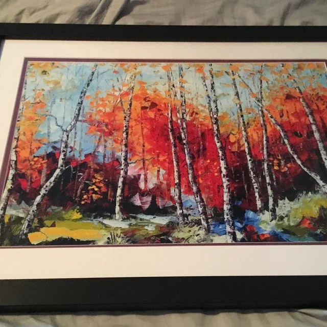 A colorful painting of a forest scene with trees bearing orange, red, and yellow leaves, and a small stream flowing through the forest floor.
