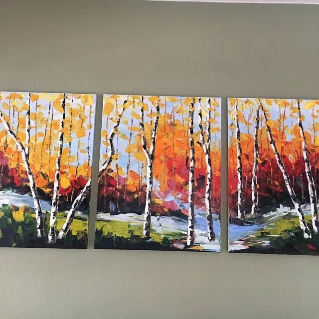 Triptych painting of a colorful autumn forest scene with white birch trees and vibrant orange, yellow, and red foliage.