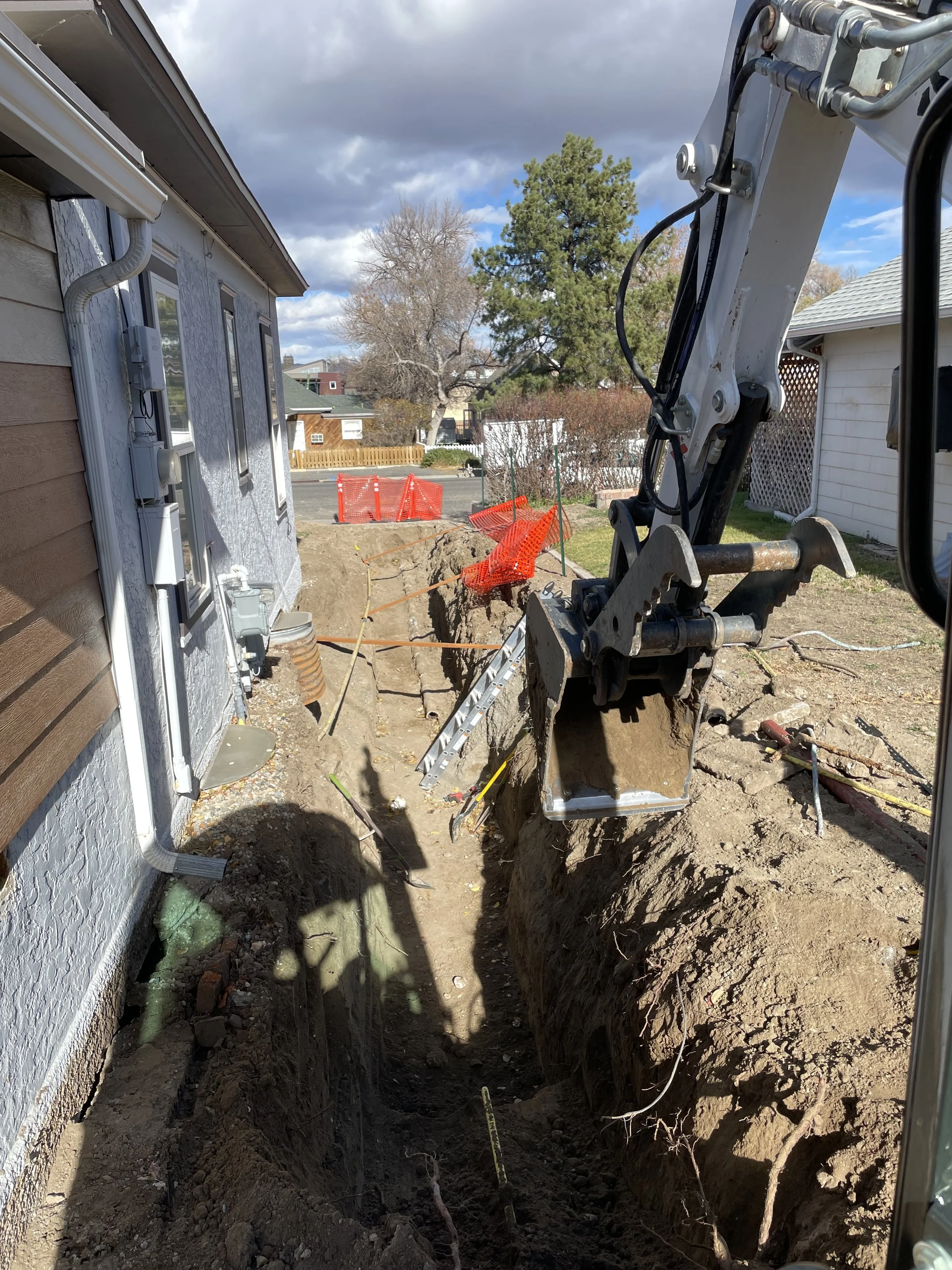 Cody Wyoming dirt work excavation gas line water line sewer line repair City of Cody contractors excavator