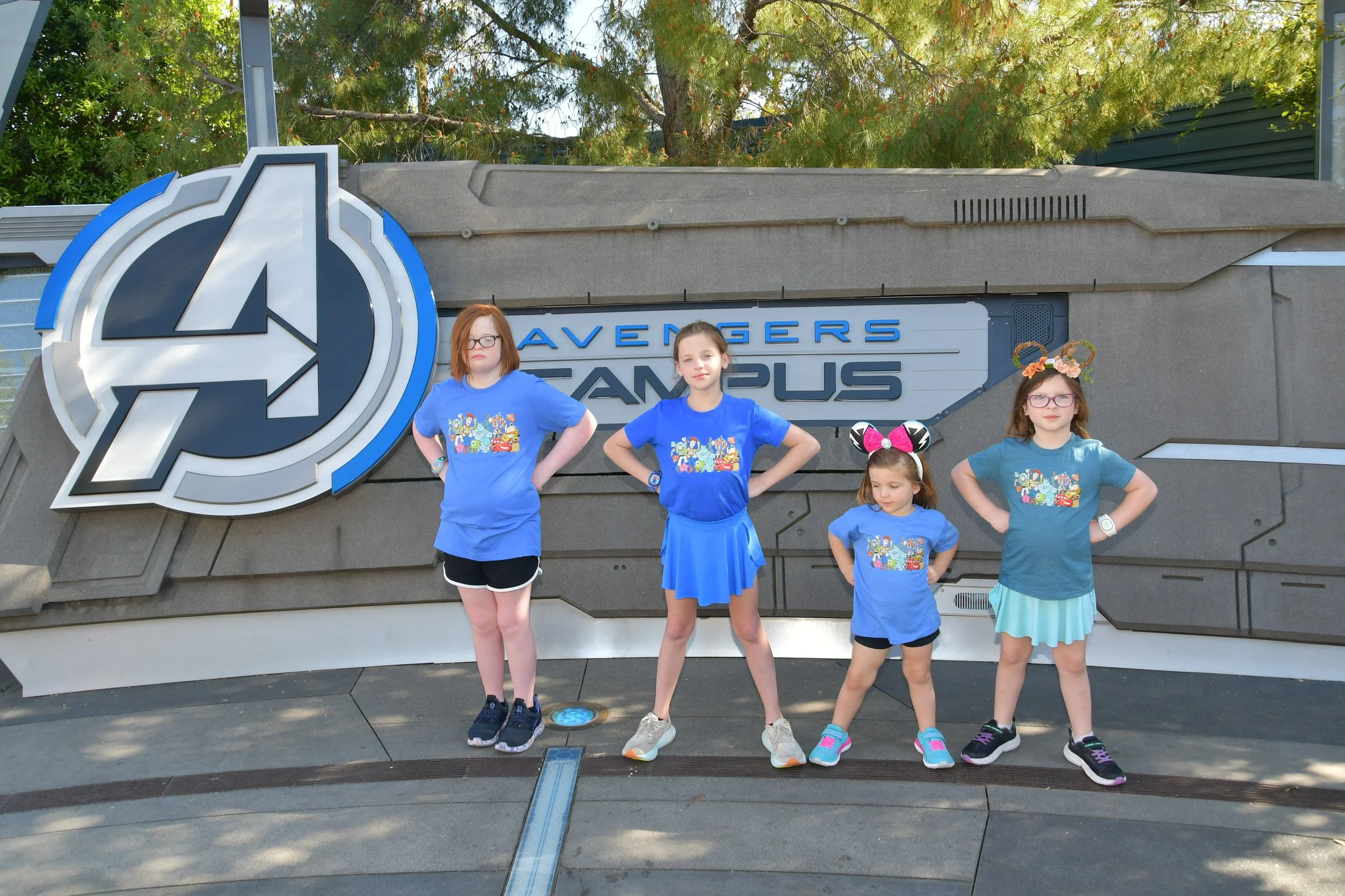 Turnwald girls standing in front of the Avengers Campus sign at Disney California Adventure.