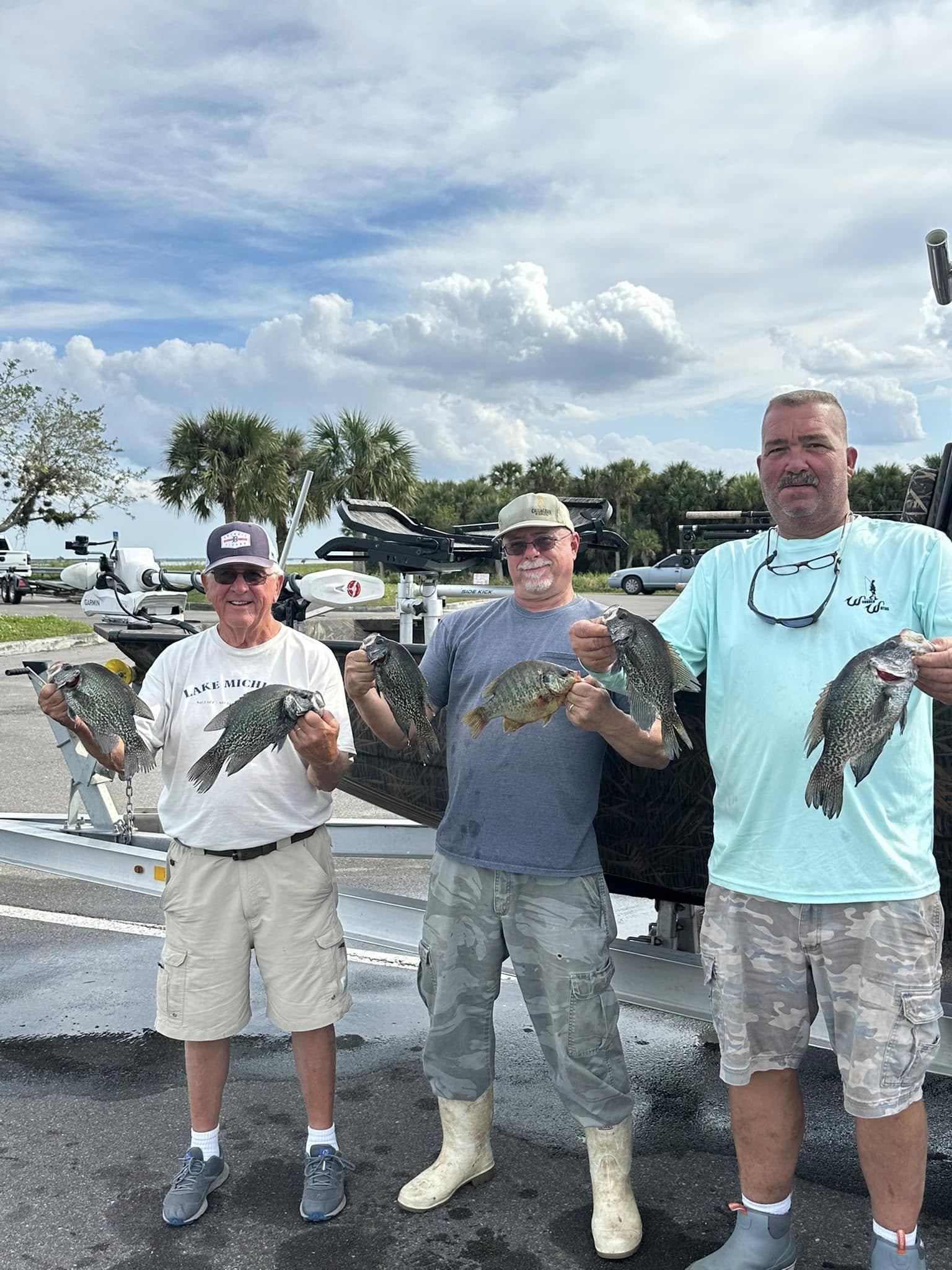 captain mike with happy clients.jpg