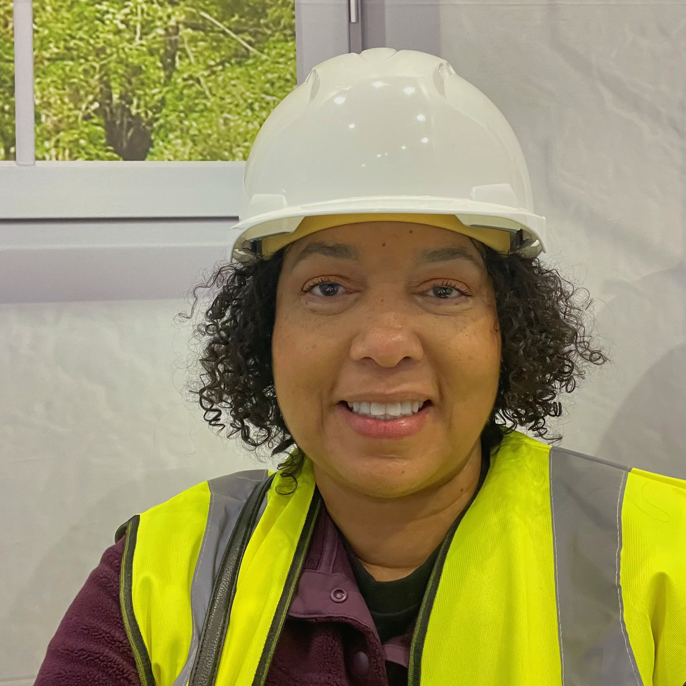Christal wearing safety gear during a build