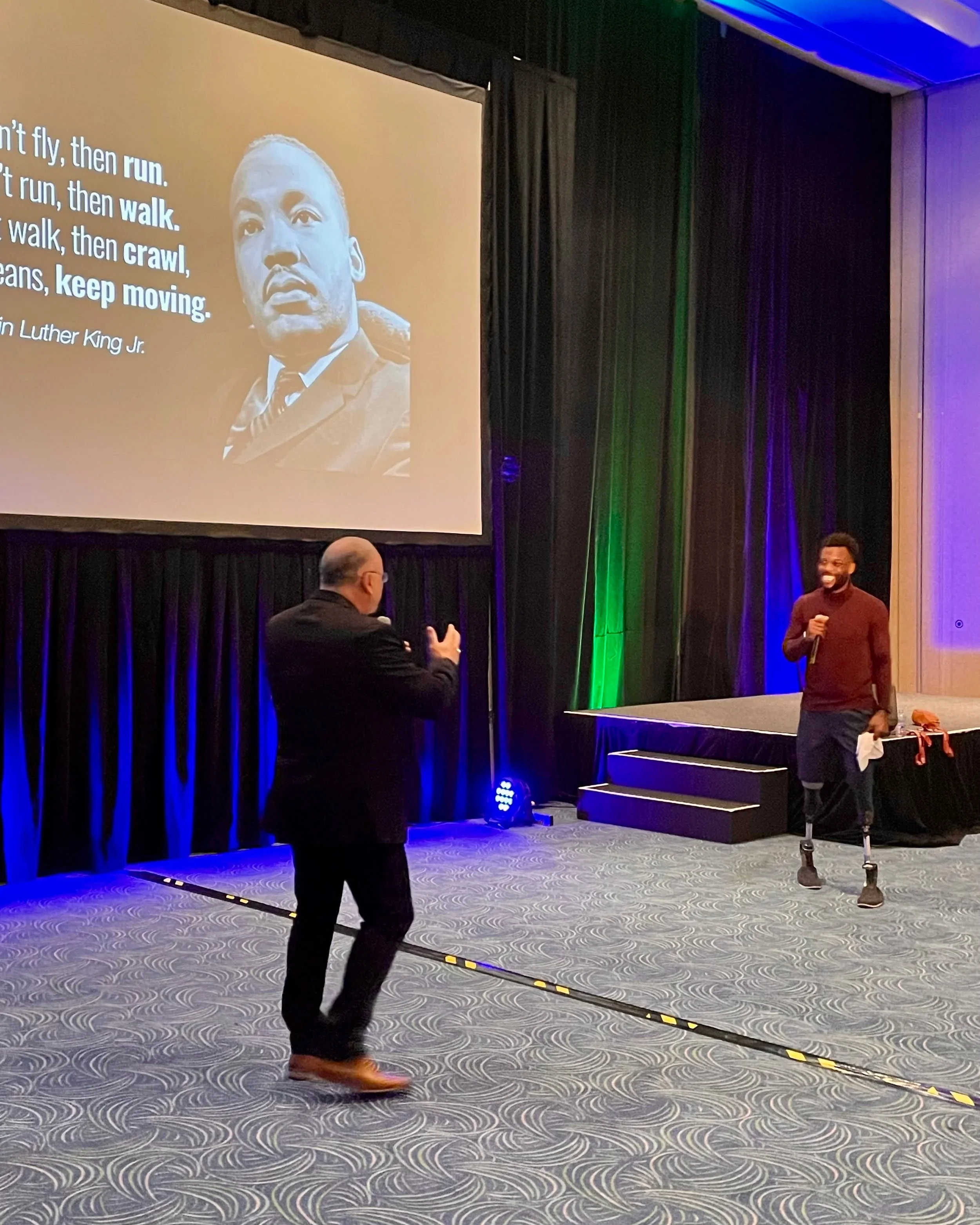 Facilitator asking Keynote speaker, Paralympian Blake Leaper questions after incredible, heartfelt, motivating speech. 