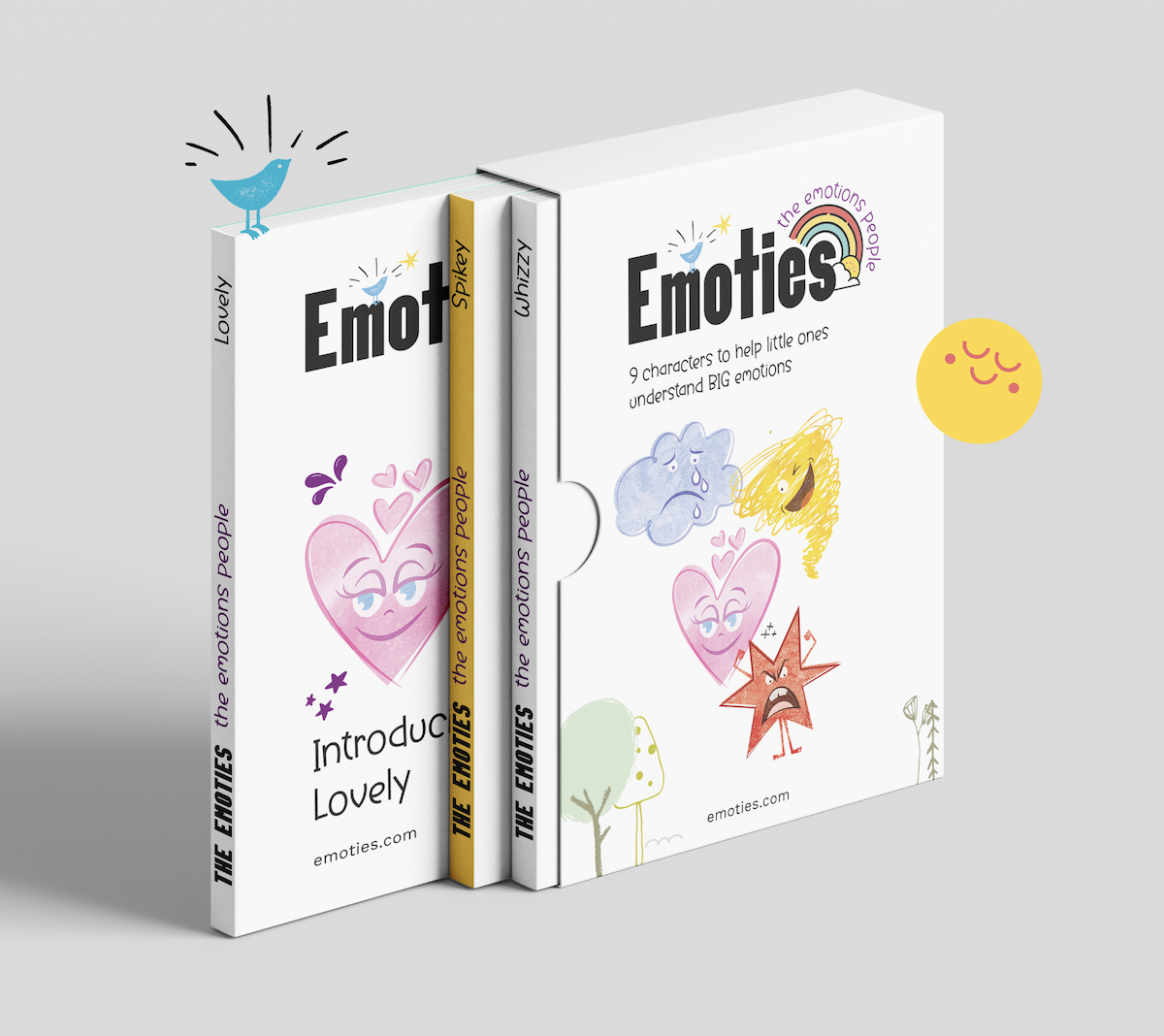 A set of three children's books titled "The Emoties" with illustrations of animated characters representing different emotions, including a smiling pink heart, cloud, star, and a yellow scribble face. The covers feature colorful, playful drawings and the tagline "9 characters to help little ones understand BIG emotions".