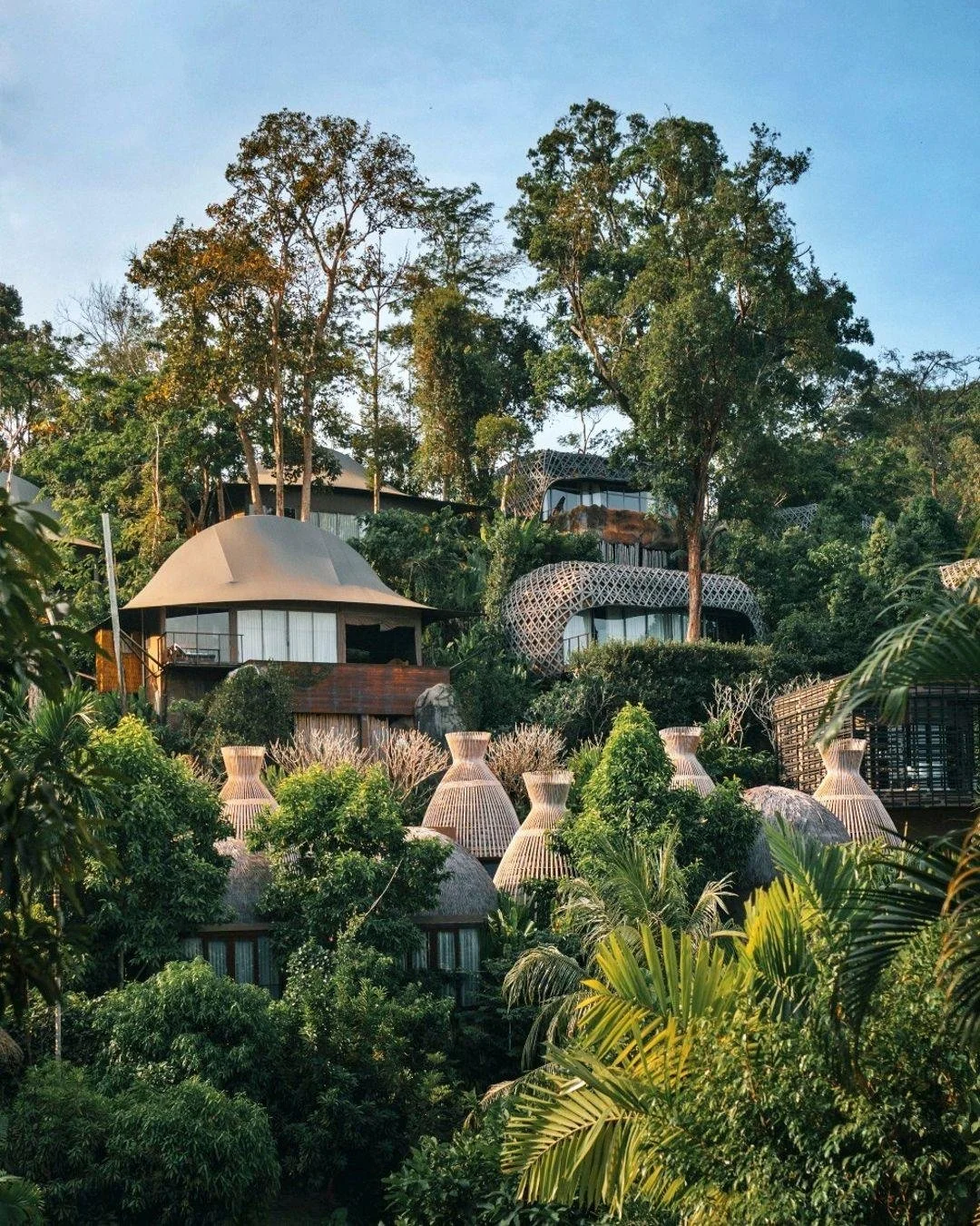 Hidden within the jungle-covered hills of Phuket is a collection of villas that feel almost otherworldly.

Inspired by mythical tribes and Thai folklore, each private pool villa is a sculptural work of art from earthy beehive-shaped sanctuaries with 