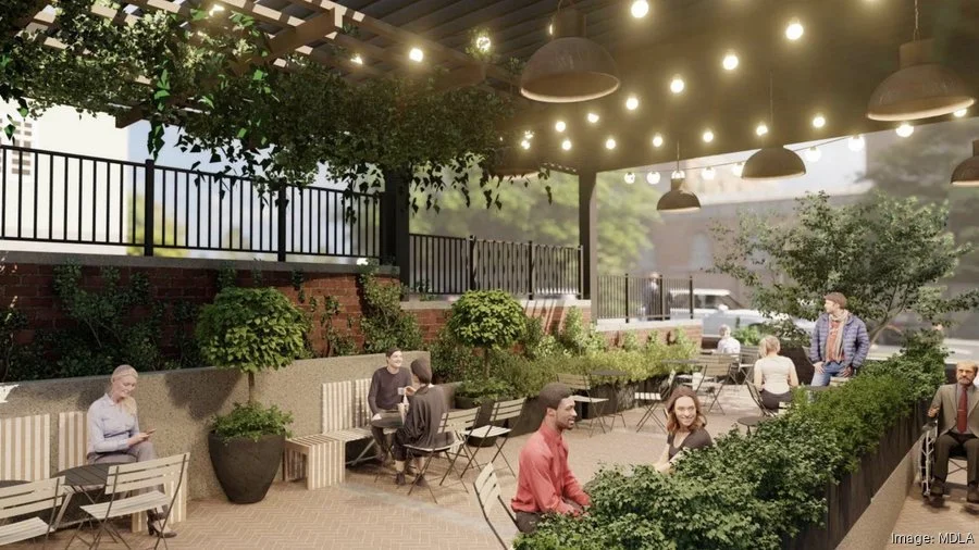  The market is planned to have two outdoor patios, including one area covered by a pergola. 