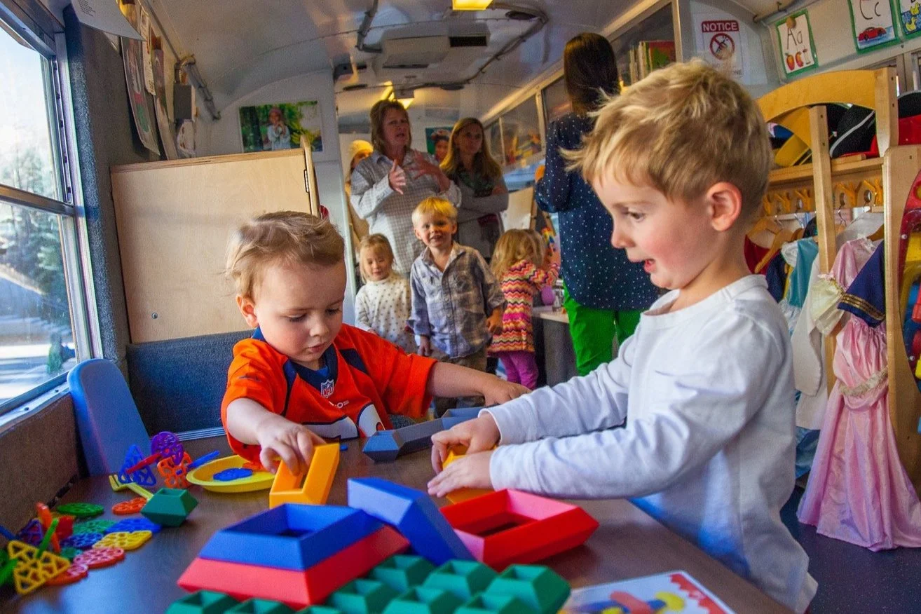 2+boys+playing+on+bus.jpg
