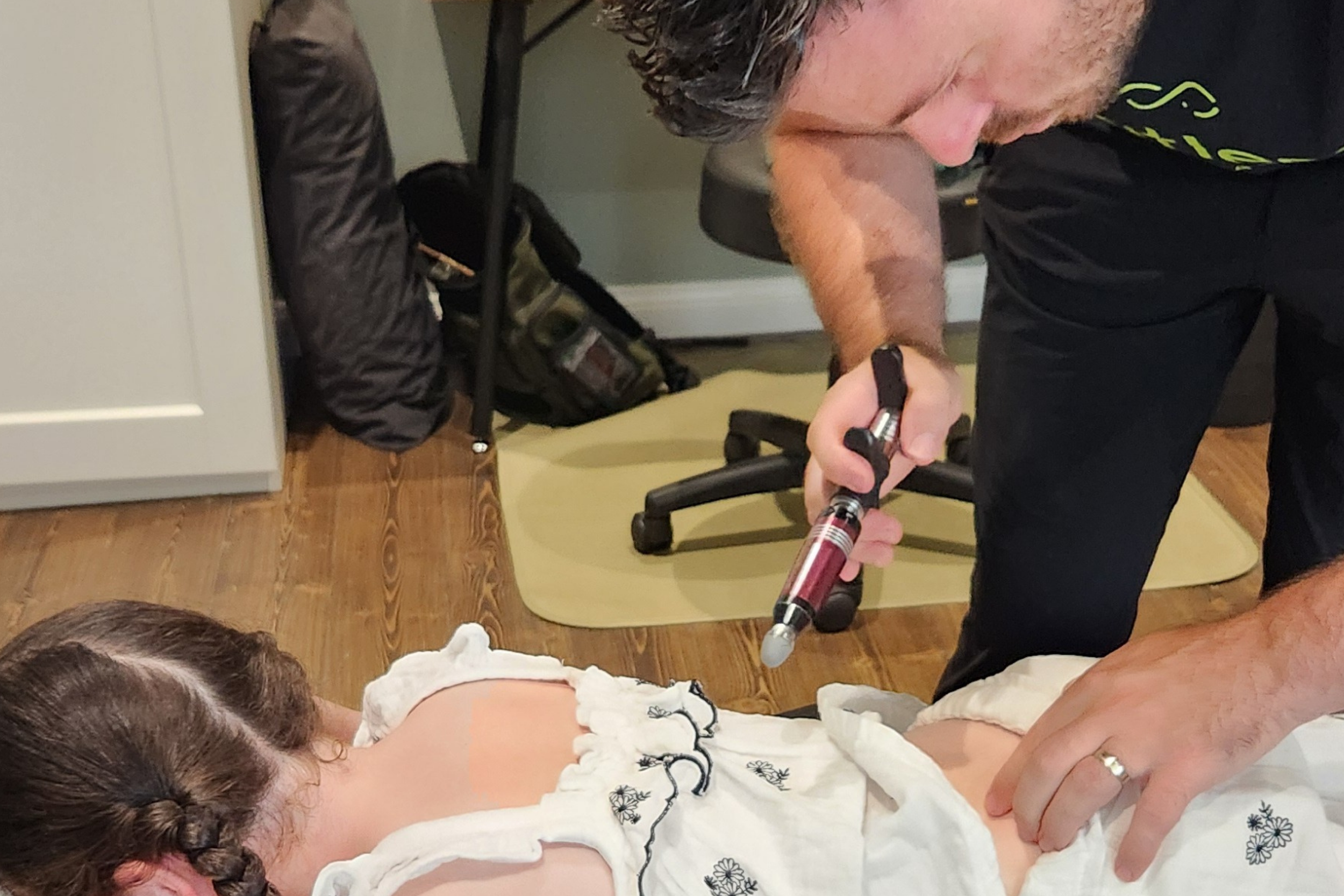 Child receiving chiropractic care