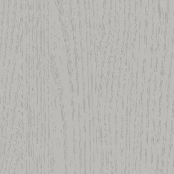 Close-up of a light-colored wood surface with visible grain patterns.