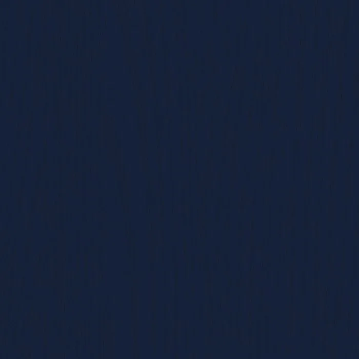 A close-up view of a dark blue, textured wooden surface.