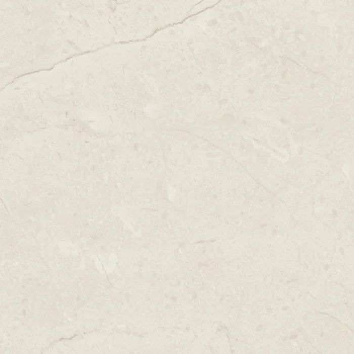 Close-up of a light-colored, textured stone or marble surface with faint natural veining.