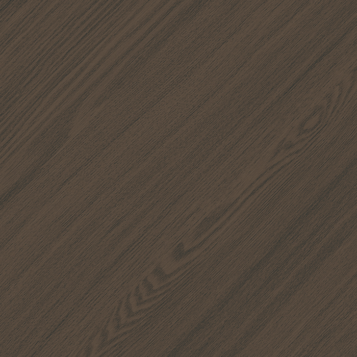 Close-up of a wooden surface with a dark brown finish and visible wood grain patterns.
