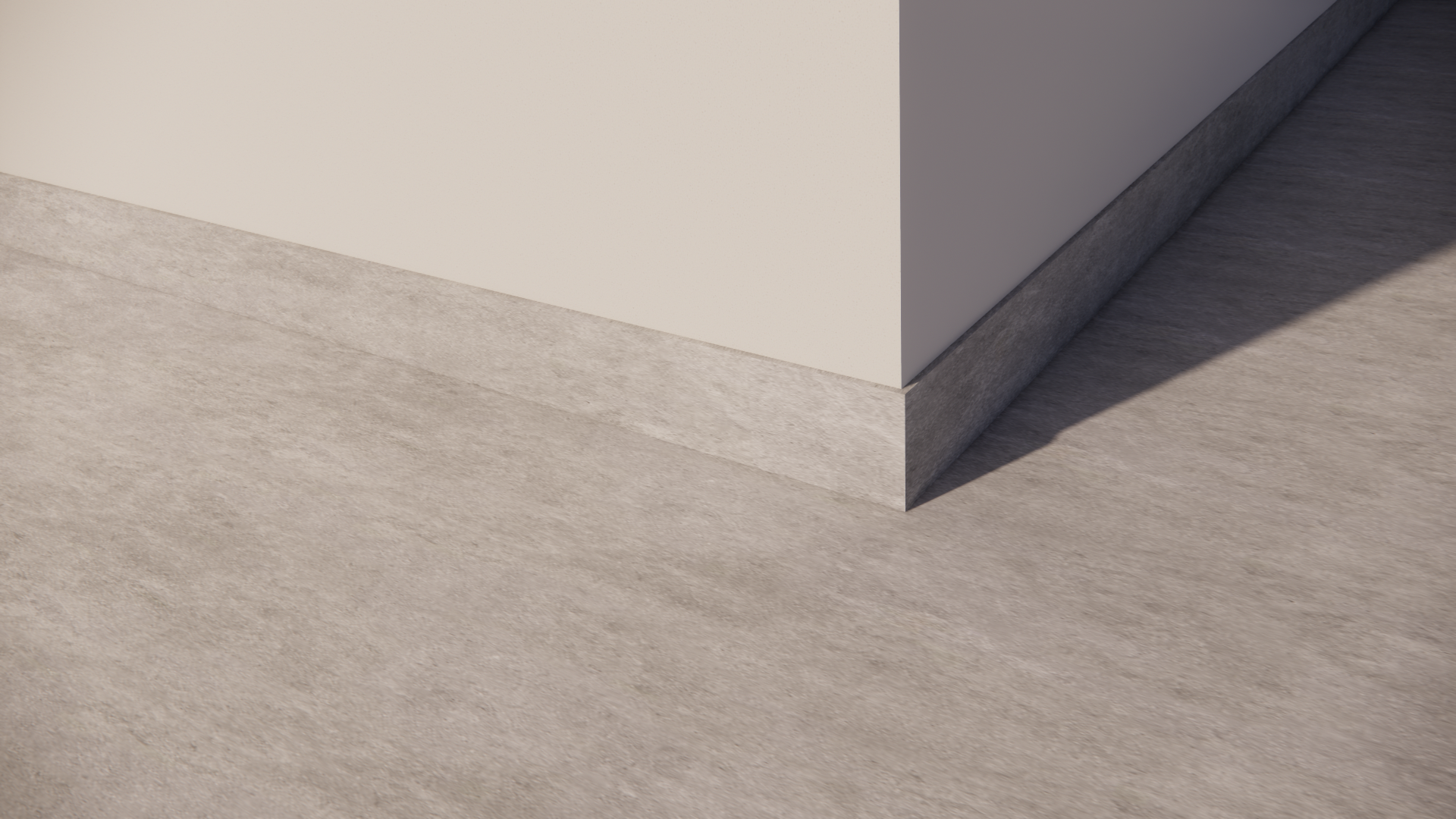 Close-up of a corner of a white piece of furniture with gray baseboard on a light-colored wooden floor, casting a shadow.