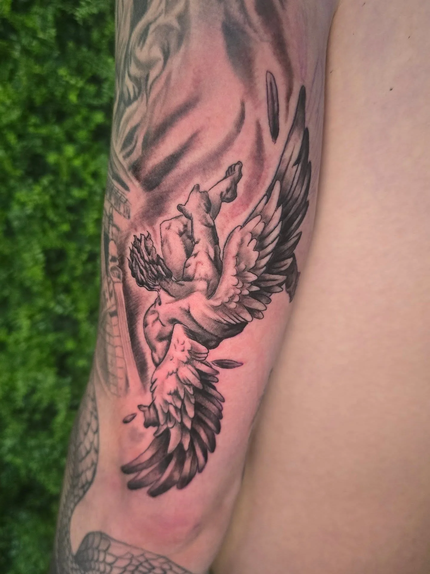 Got to do this fun falling Icarus piece dor the back side of this greek sleeve im working on and I think it was a perfect spot for him.

Now booking February. Message me or come by and schedule your next appointment with me at sovereign souls tattoo.
