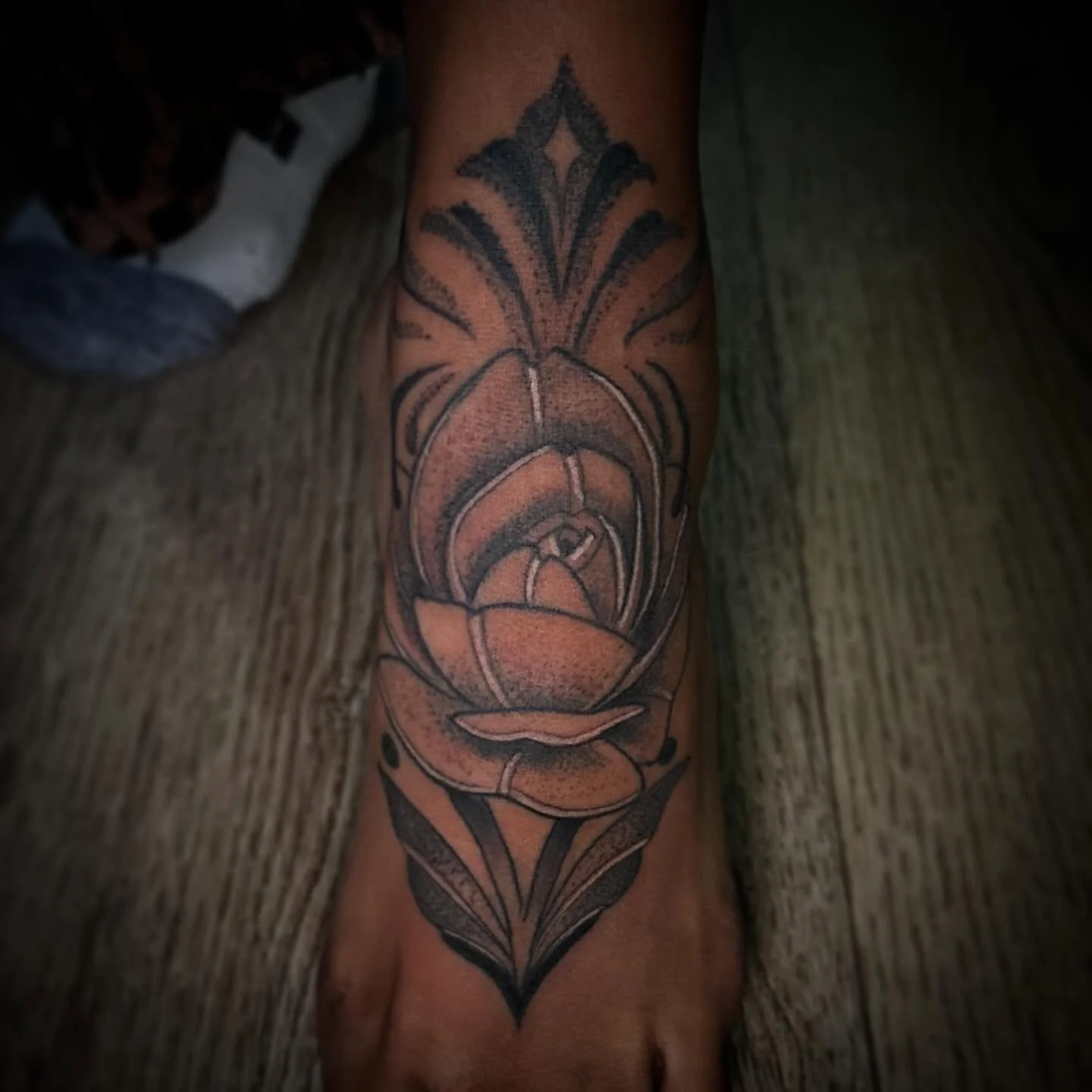 Had fun designing this foot tattoo. #foottattoo #ornamental #rosetattoo #tattooedfoot #dotwork