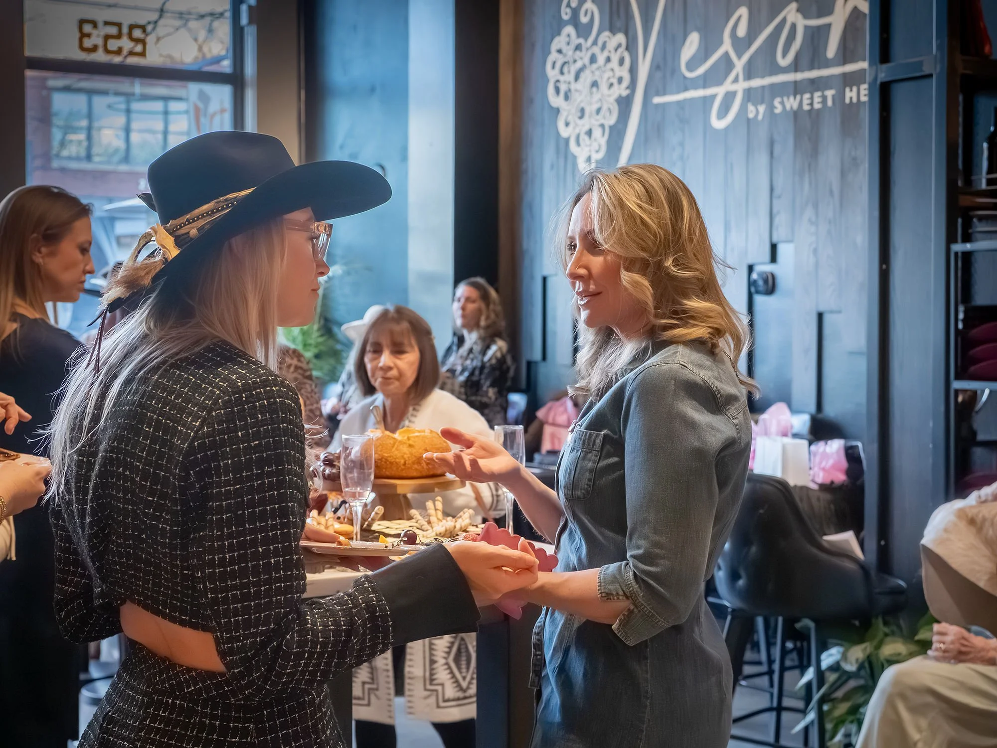 Styled event vignette highlighting Moss Custom Hat Bar within a luxury event design and hospitality setting.