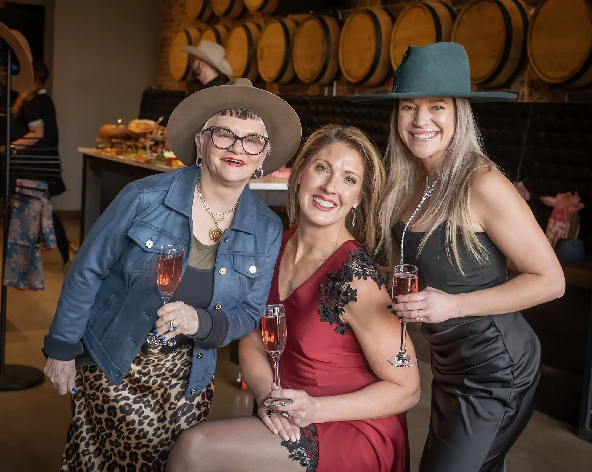 Luxury event activation showcasing custom hat styling as unique entertainment for high-end planners and clients.