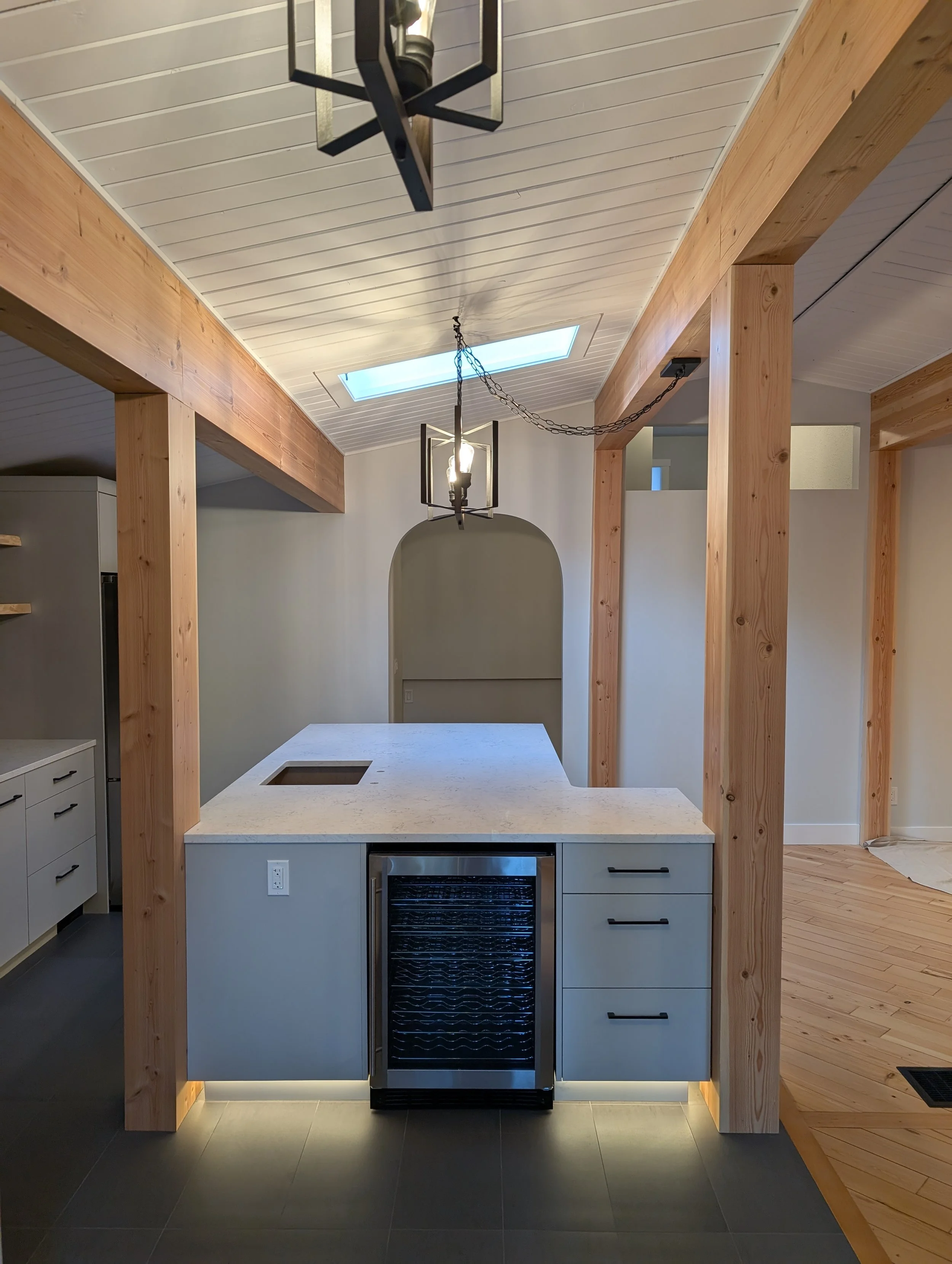 How We Transformed Painted Beams Into Natural Wood Features | Comox Valley Kitchen Renovation