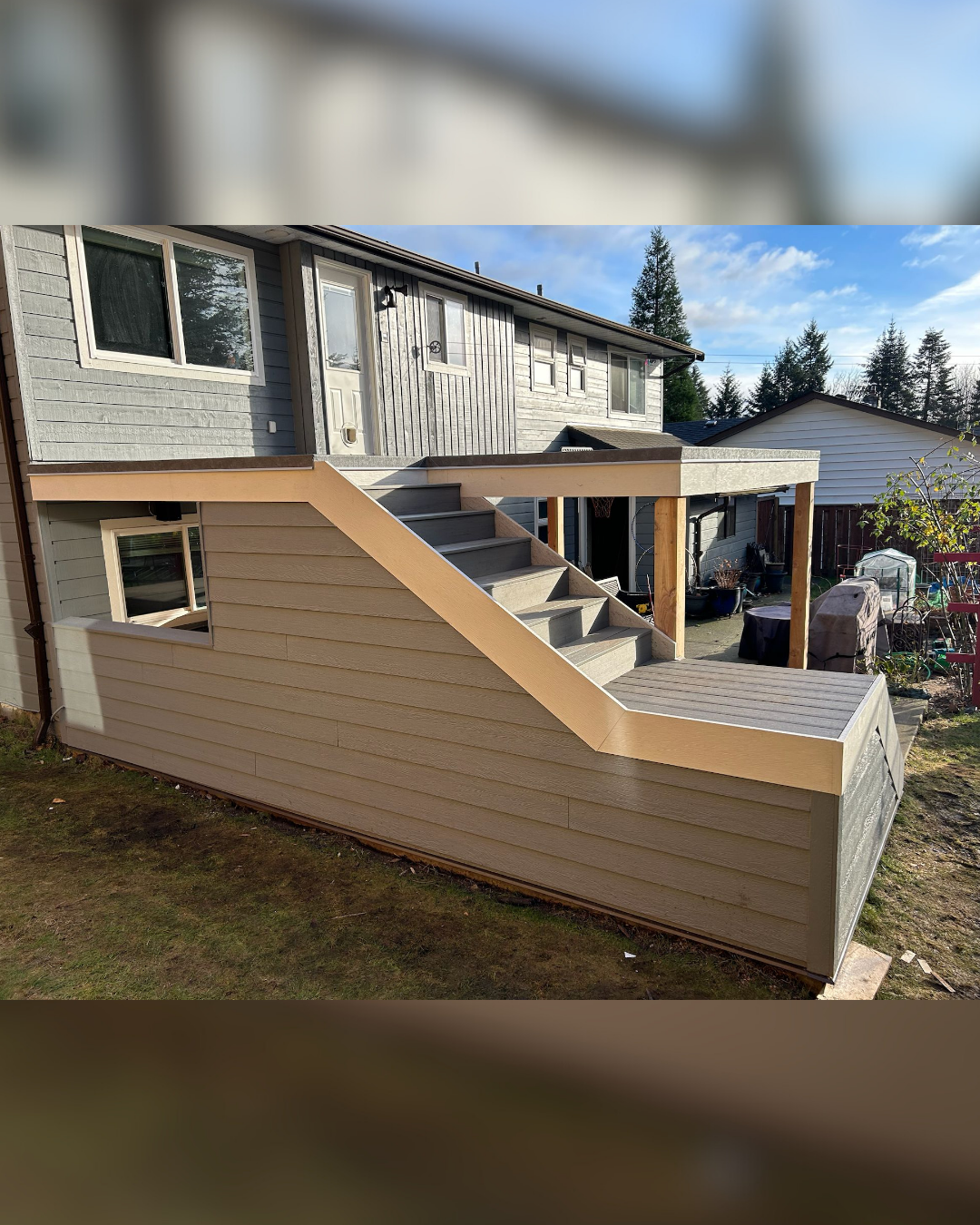 Deck and stairs upgrade for Campbell River homeowner using rot proof materials and adding covered storage.