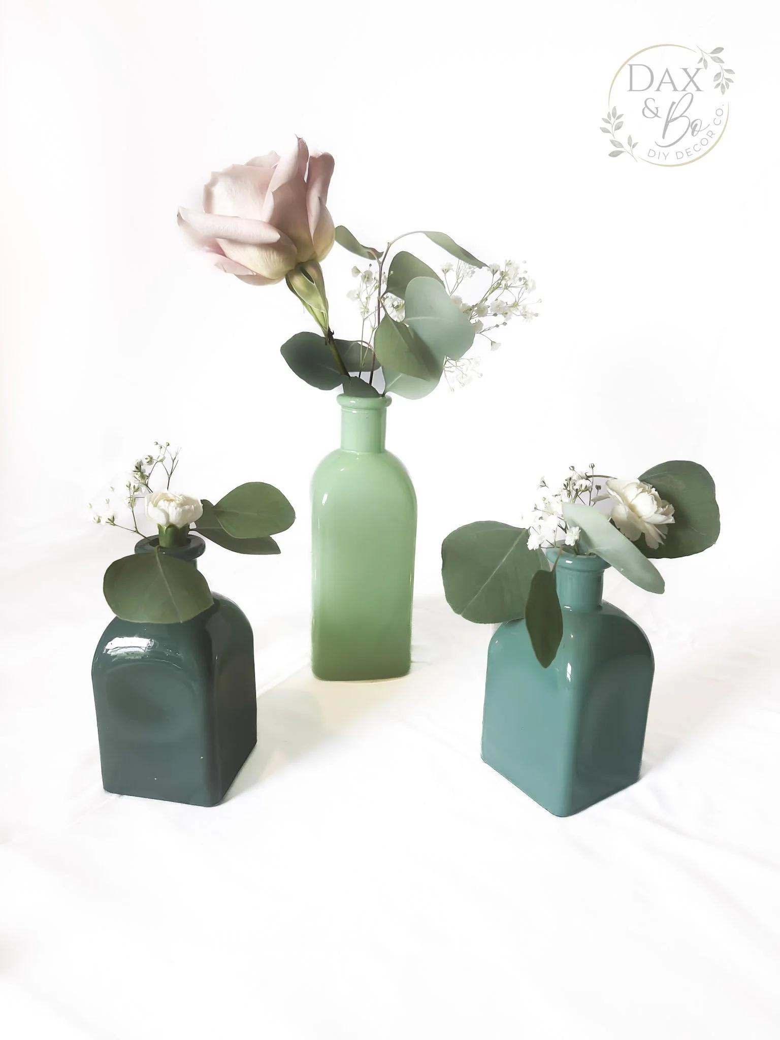 green-bud-vase-trio-centerpiece-daxbo.jpg