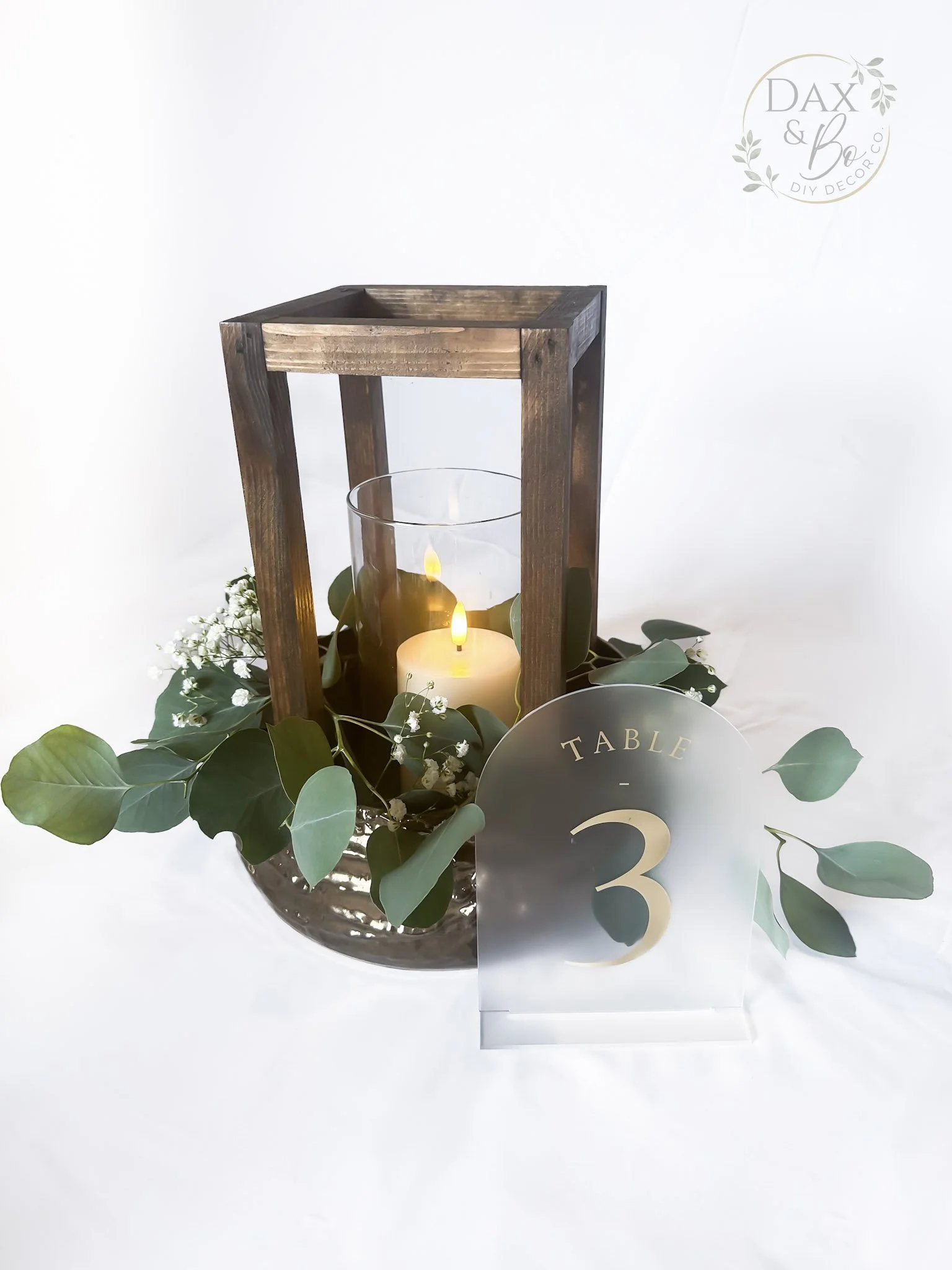wood-lantern-eucalyptus-centerpiece-daxbo.jpg