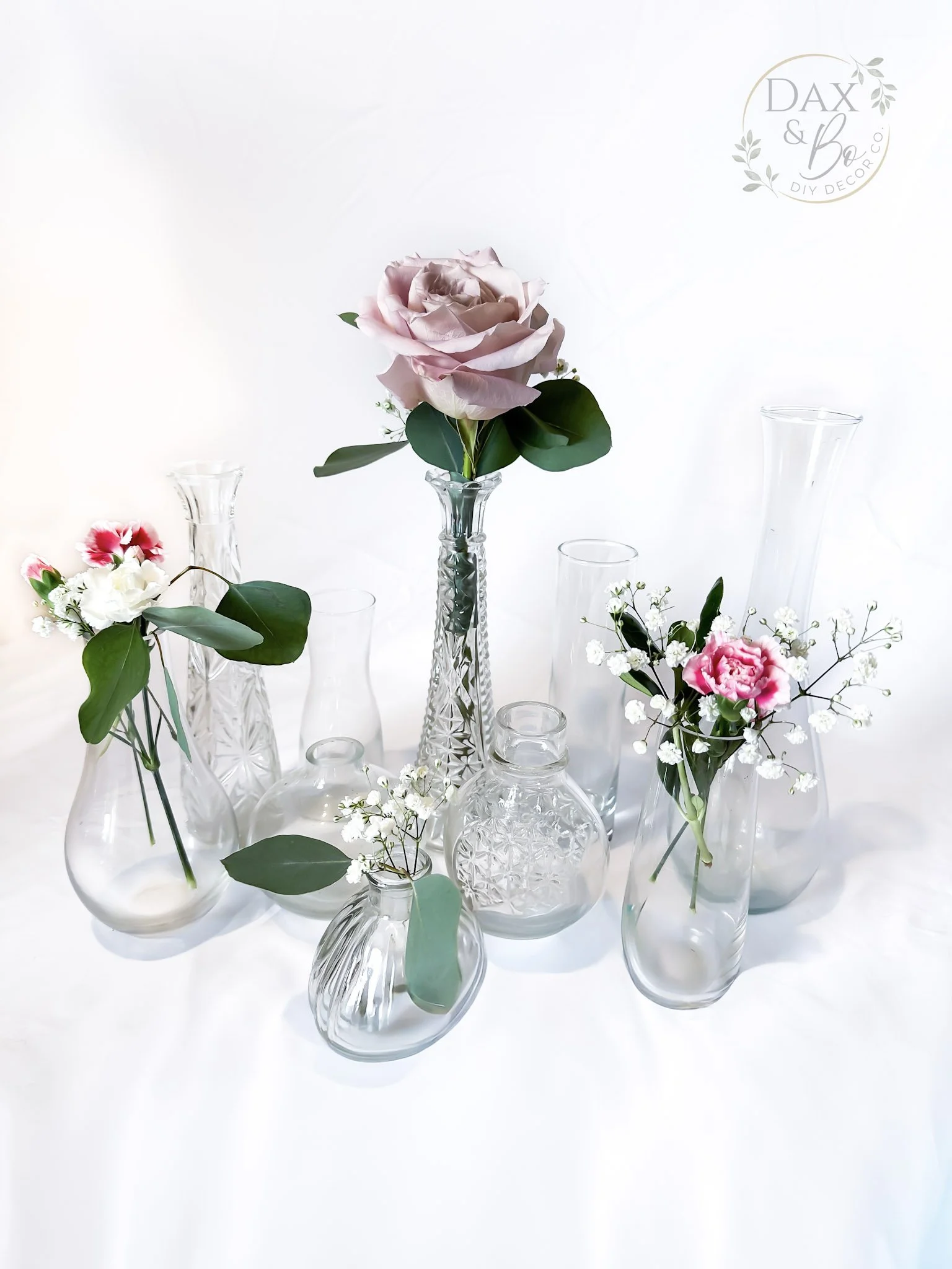 clear-bud-vases-with-florals-daxbo.jpg