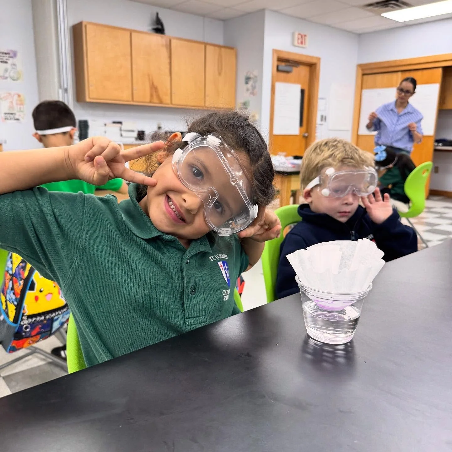 What happens when our young Knights put on their goggles? 🤓👩&zwj;🔬👨&zwj;🔬 Pure wonder, lots of giggles, and science in action! ✨ #HandsOnLearning #ChemistryClub