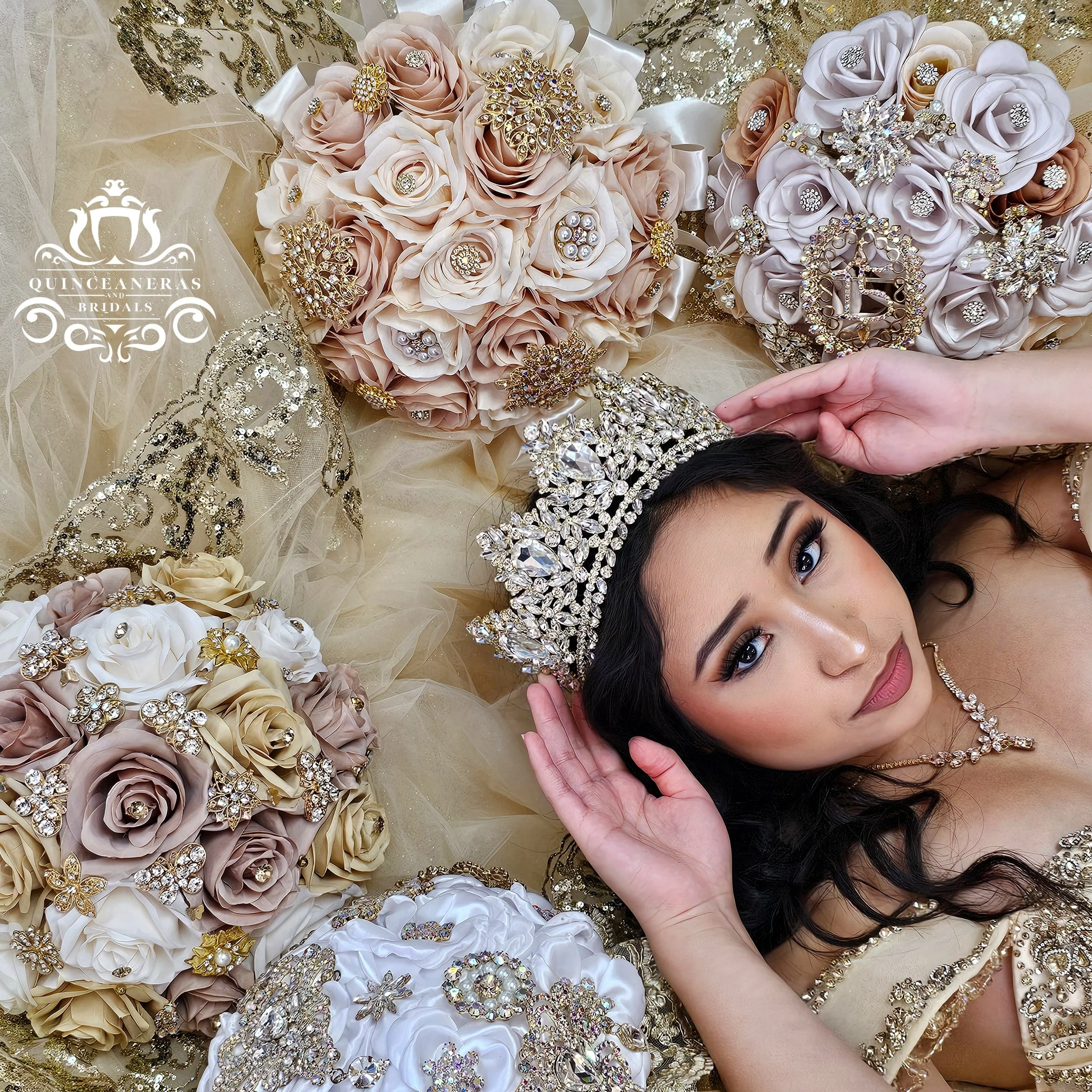 A girl laying down in a champagne gold quince dress surrounded by quince bouquets in tones of cream, ivory, gold and champagne. She is also wearing a quince crown.