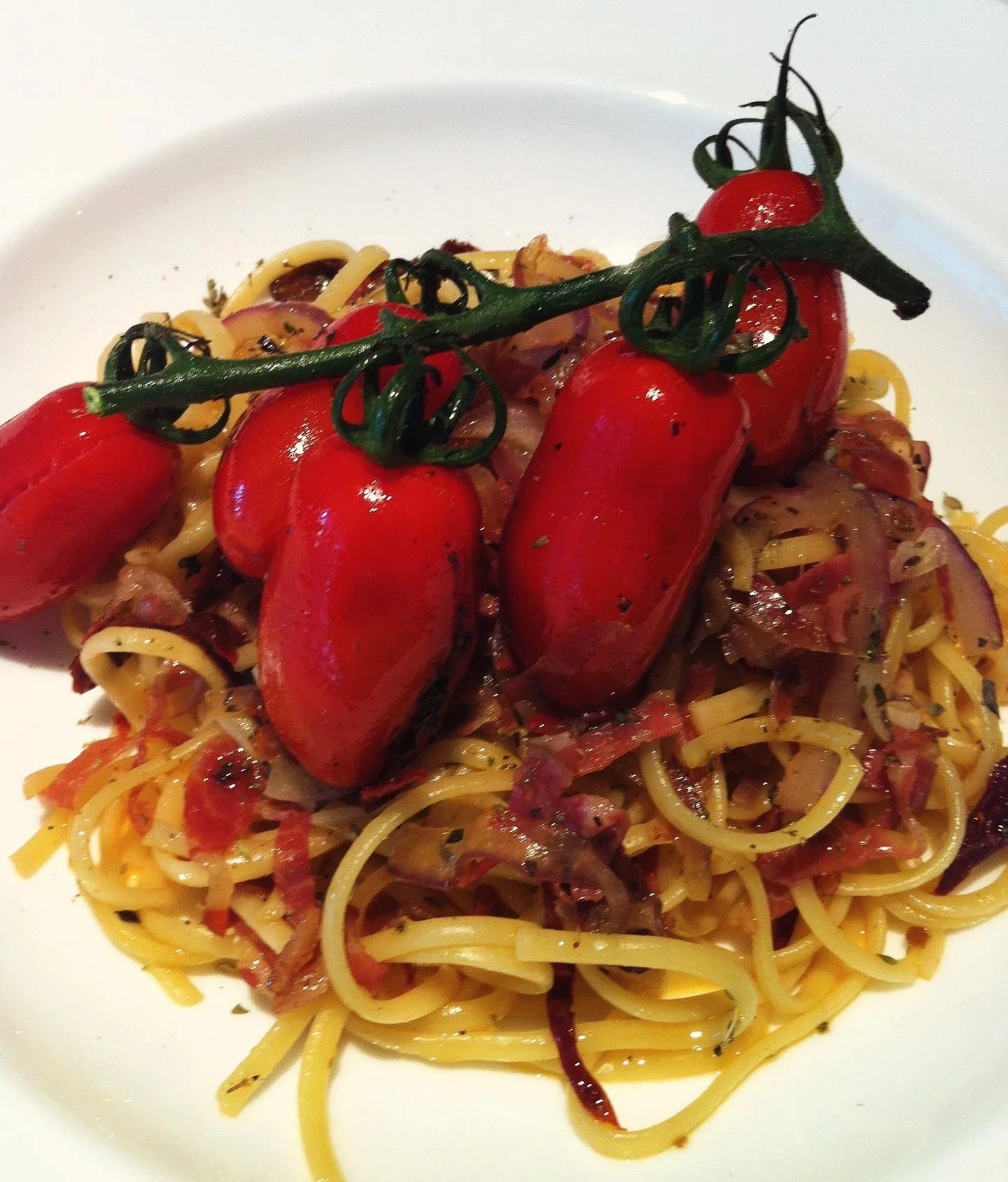 🇮🇹🍝🍅Tagliolini con Capocollo e Pomodorini Italiani 
by Chef Giovanni Trigona

A celebration of Italian heritage on every forkful. Chef Giovanni Trigona presents delicate tagliolini paired with the bold, savory flavor of capocollo, a traditional I
