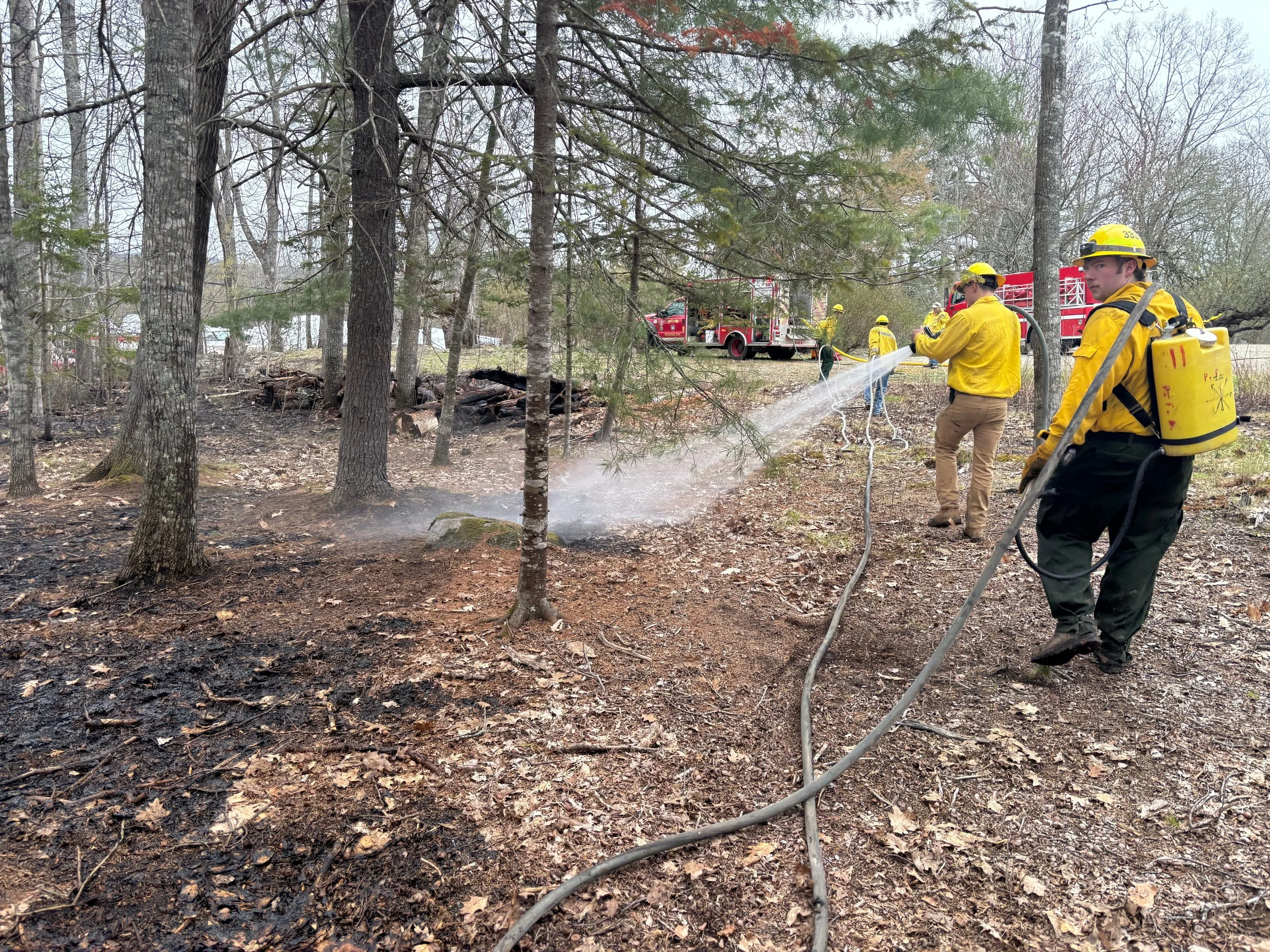 Multiple crews stop wildland fire 20 feet from Penobscot home