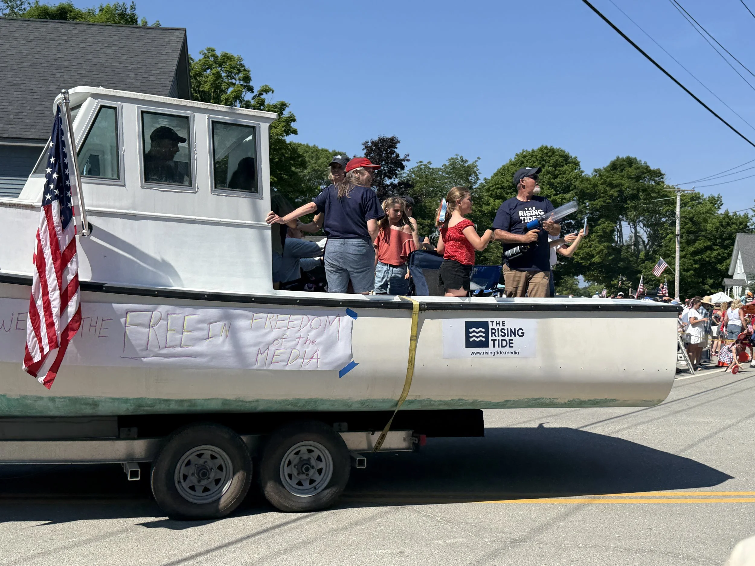 The crew of the Rising Tide float.