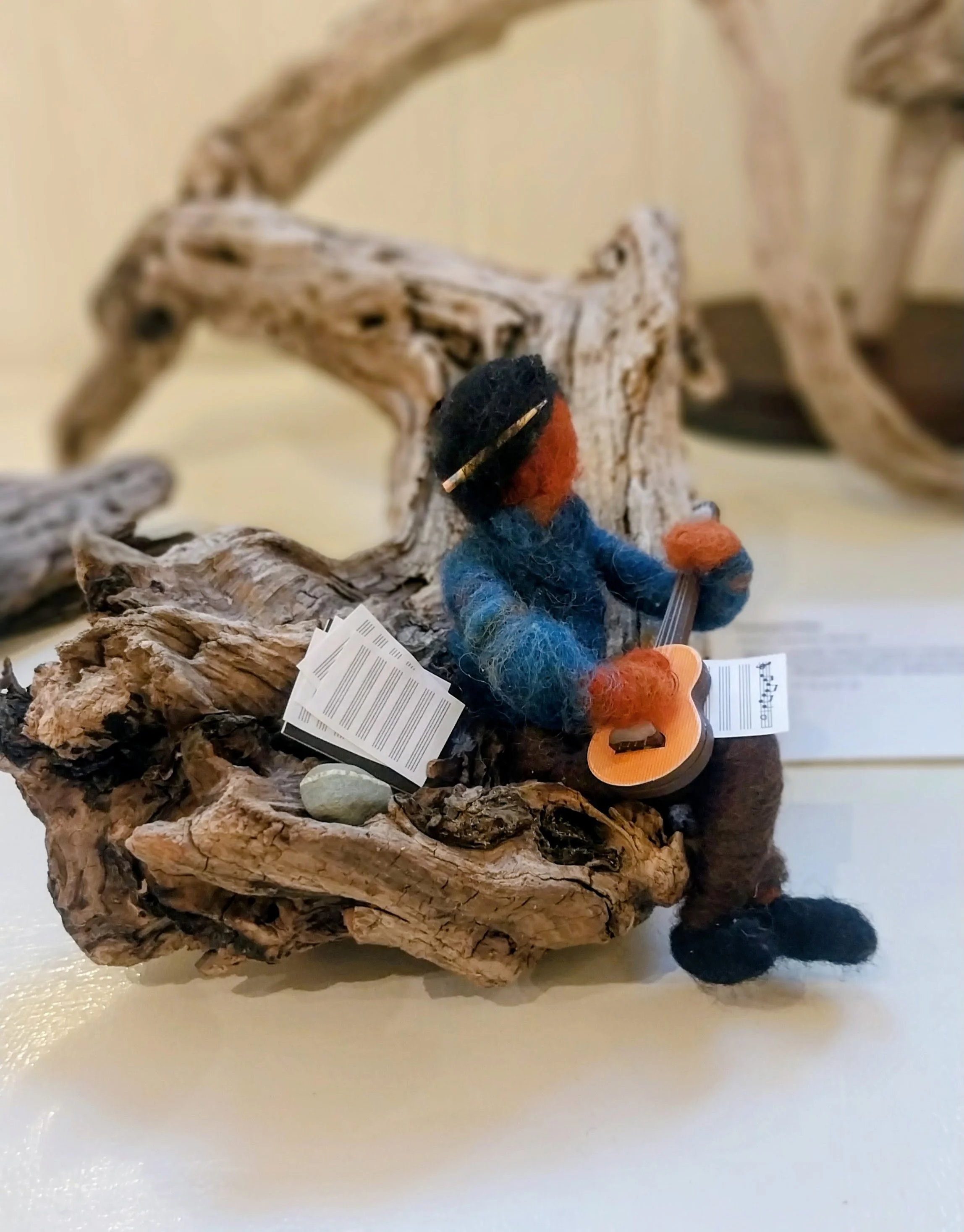 Felted guitar player, Susan Barrett Merill