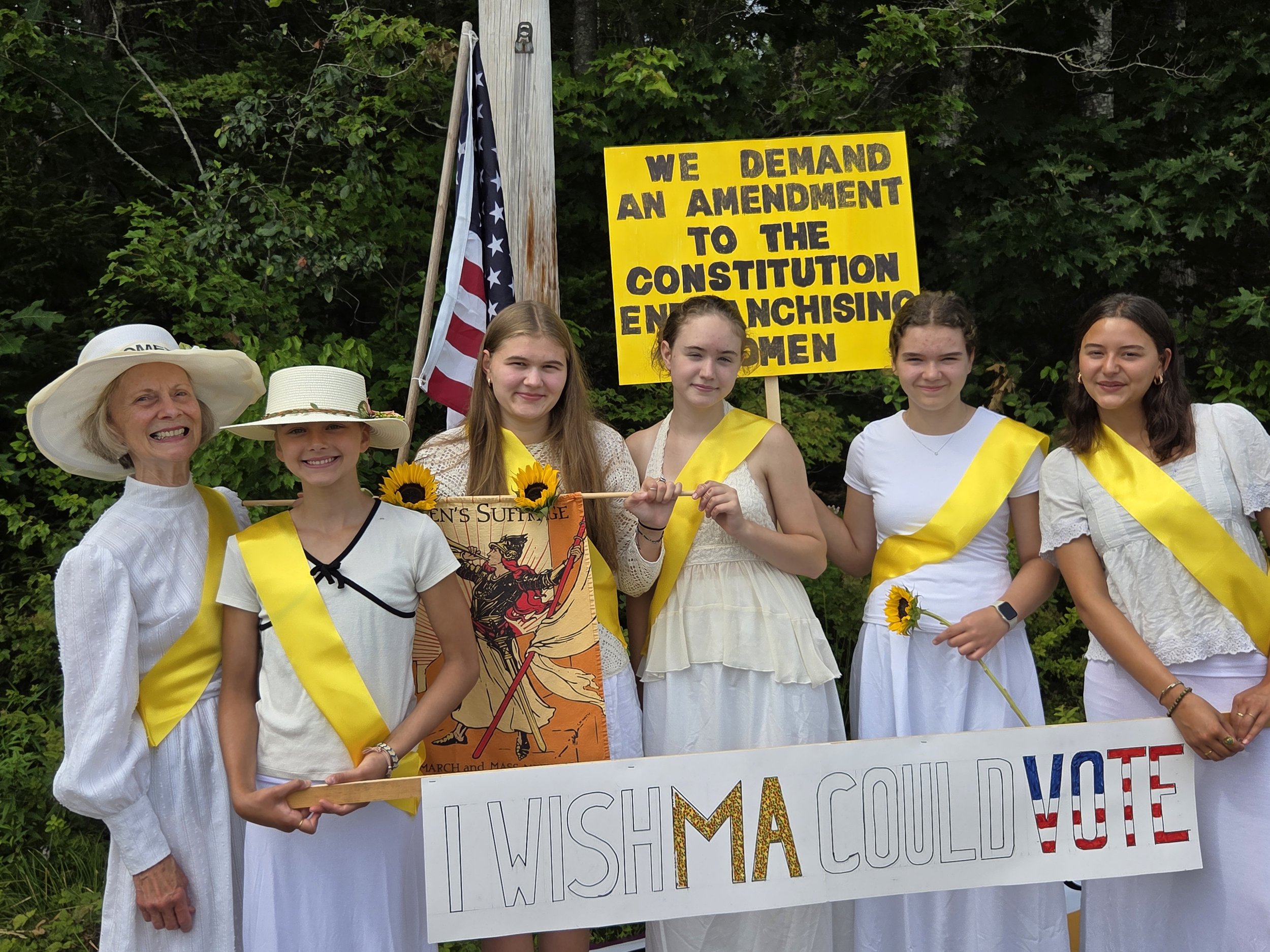 Linda Currie and her granddaughters promote the Equal Rights Amendment. Photo by John Epstein
