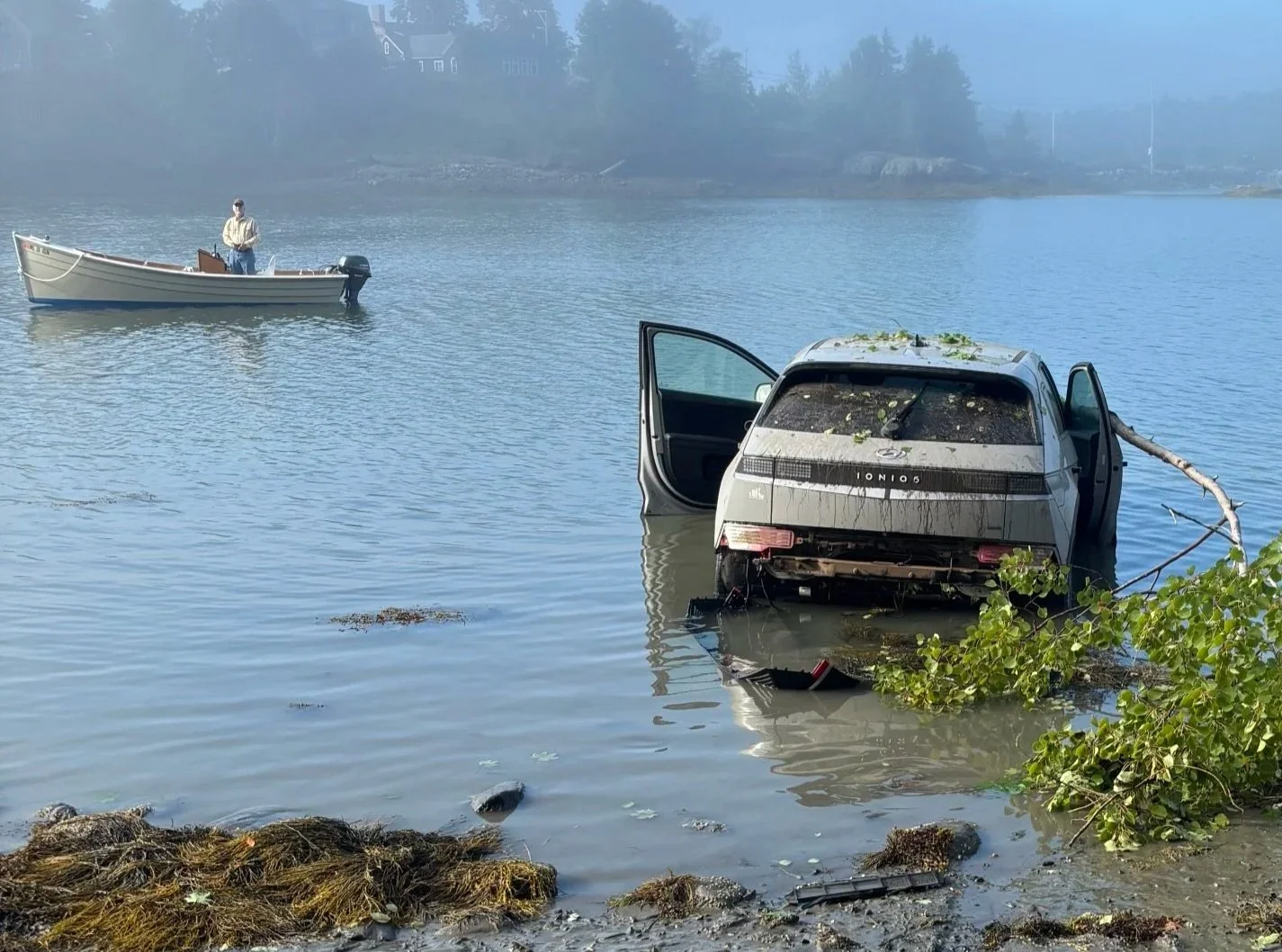 Car lands in Deer Isle mudflats