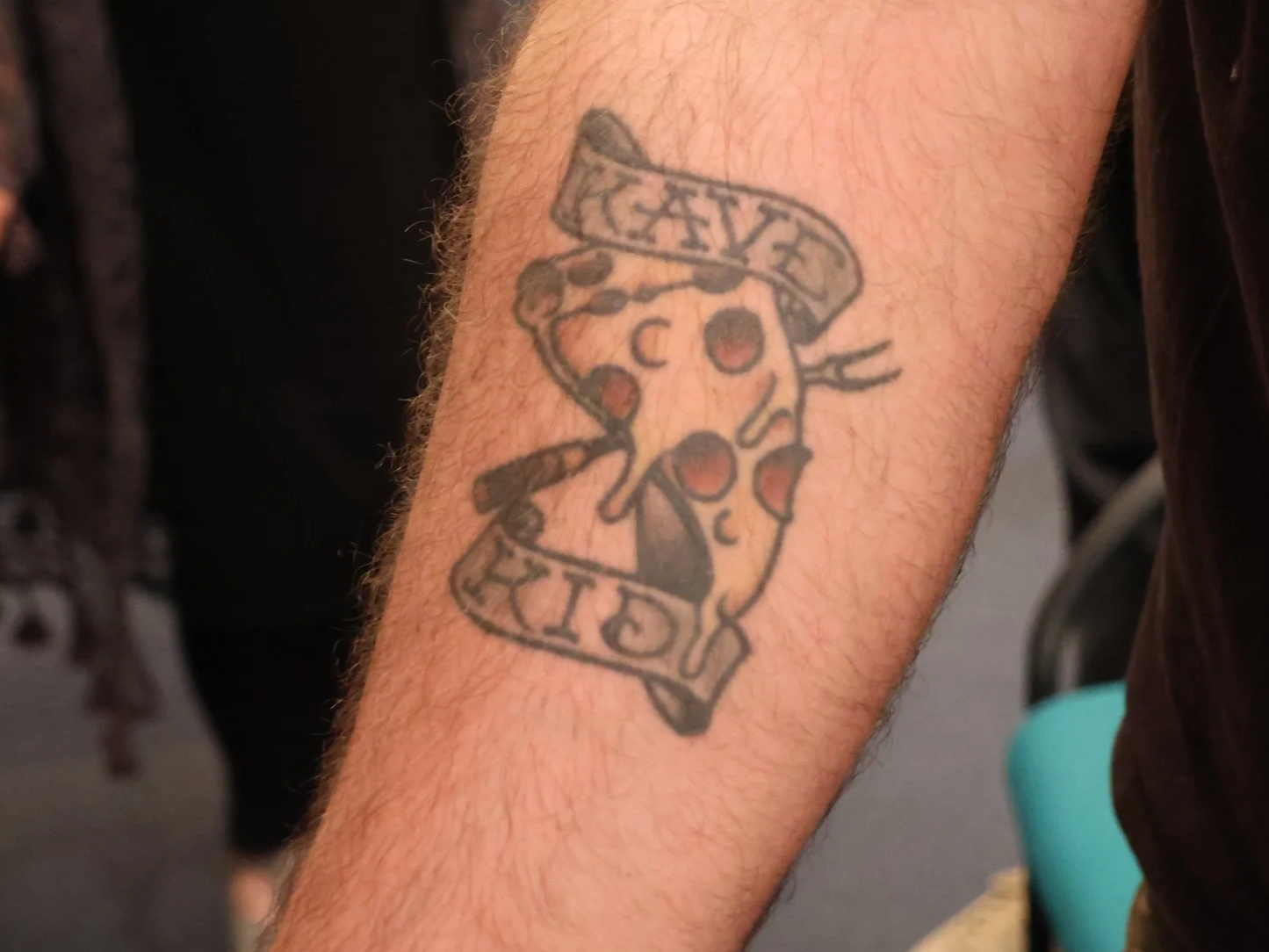 'Kave Kid' tattoo on the forearm of Matthew Dionne.