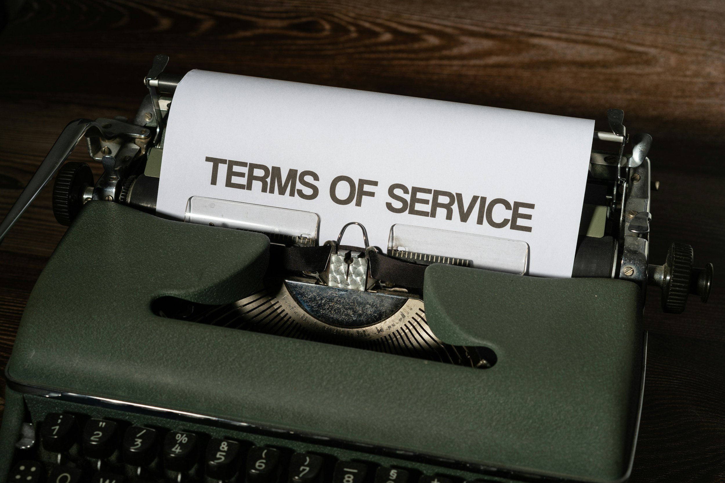 Typewriter on a desk, page with Terms Of Service typed.