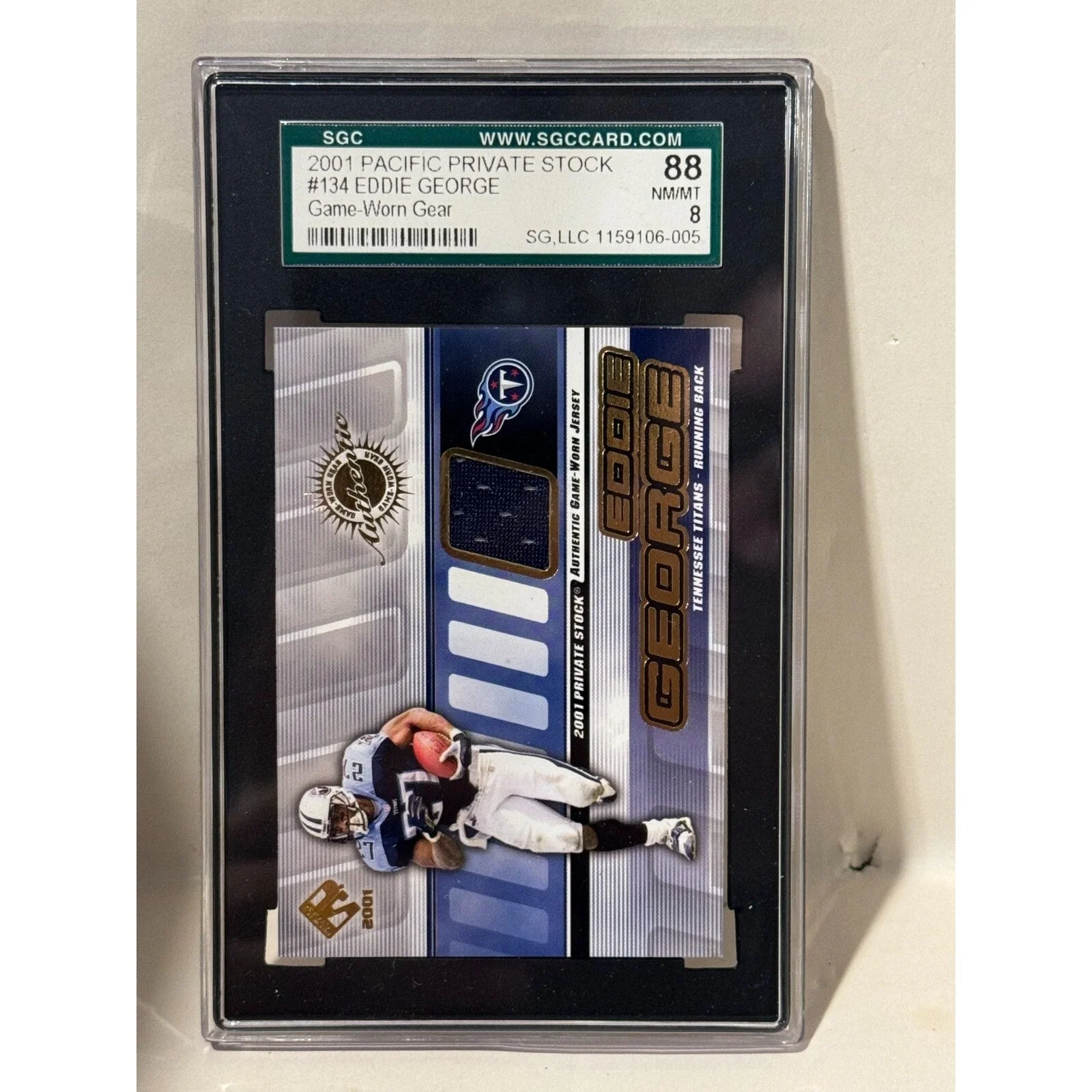 2001 Pacific Private Stock #134 Eddie George Game-Worn Gear SGC 88 NM/MT