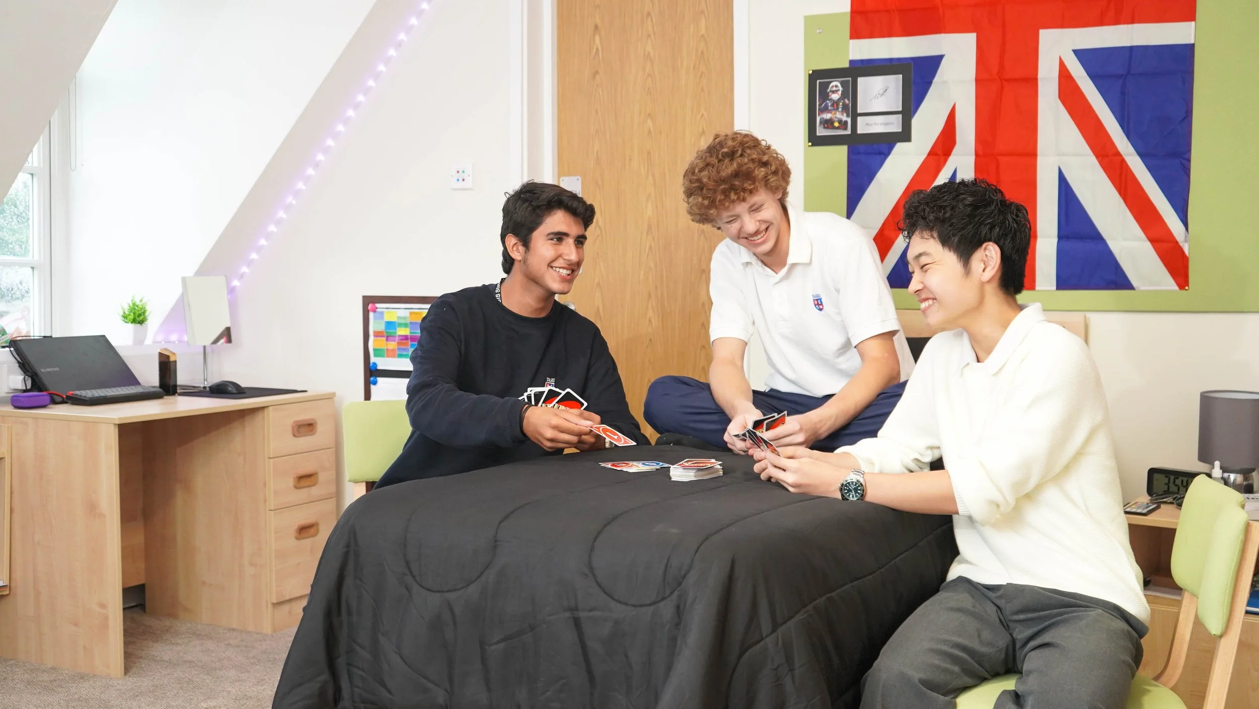 British Boarding School with British Flag and students talking