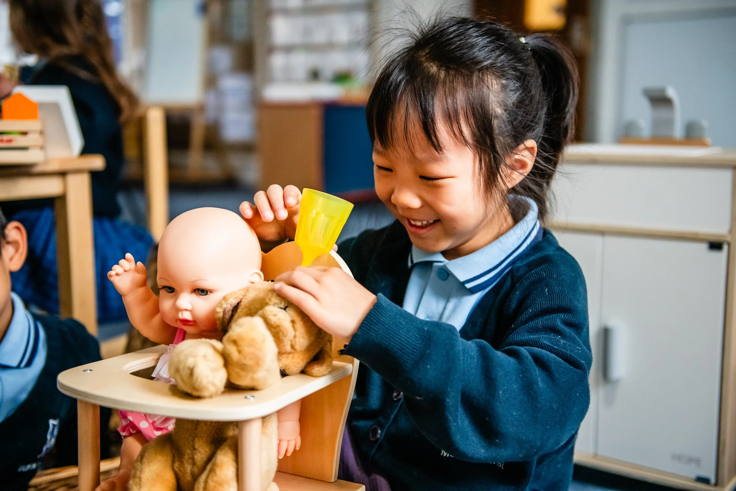 Young student blue school uniform is smiling 