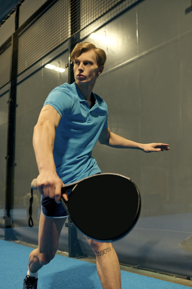 A man playing competitive pickleball.