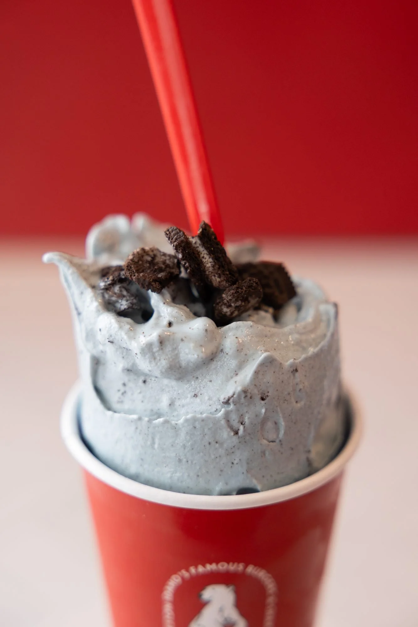 A cookies and cream shake in a red Polar Bear cup