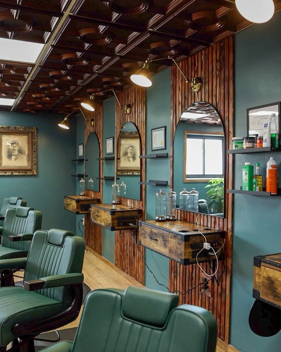 Teal walls, green leather chairs, and a record player by the door.

The space is part of why people choose a barbershop, so I spent as much time photographing the room as I did the haircuts.

When someone is deciding where to book, seeing the space h