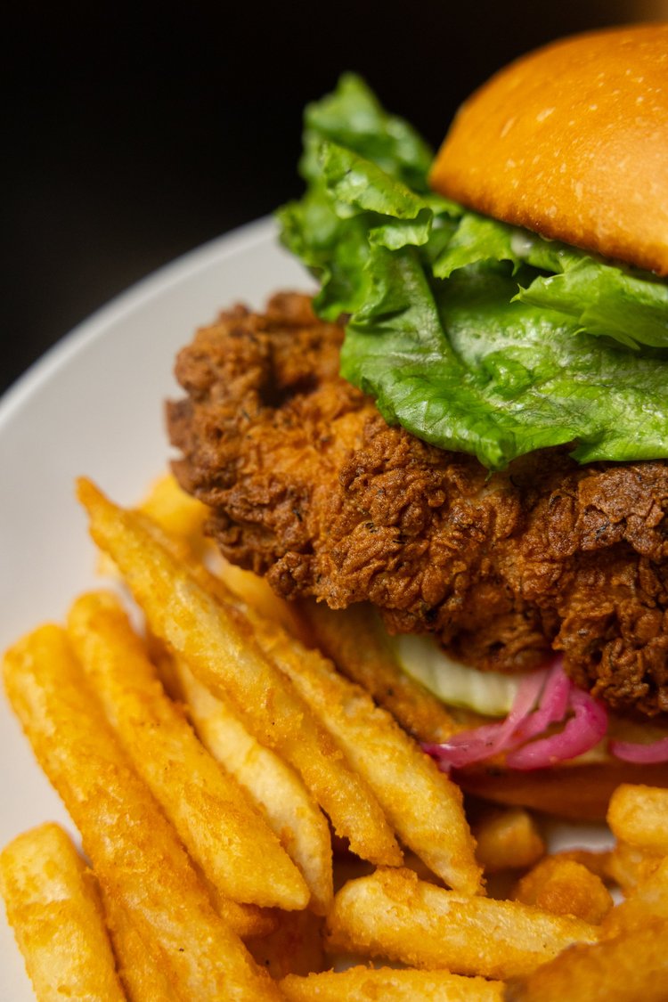 Fried chicken sandwich and fries at Prodigy Brewing in Logan, Utah
