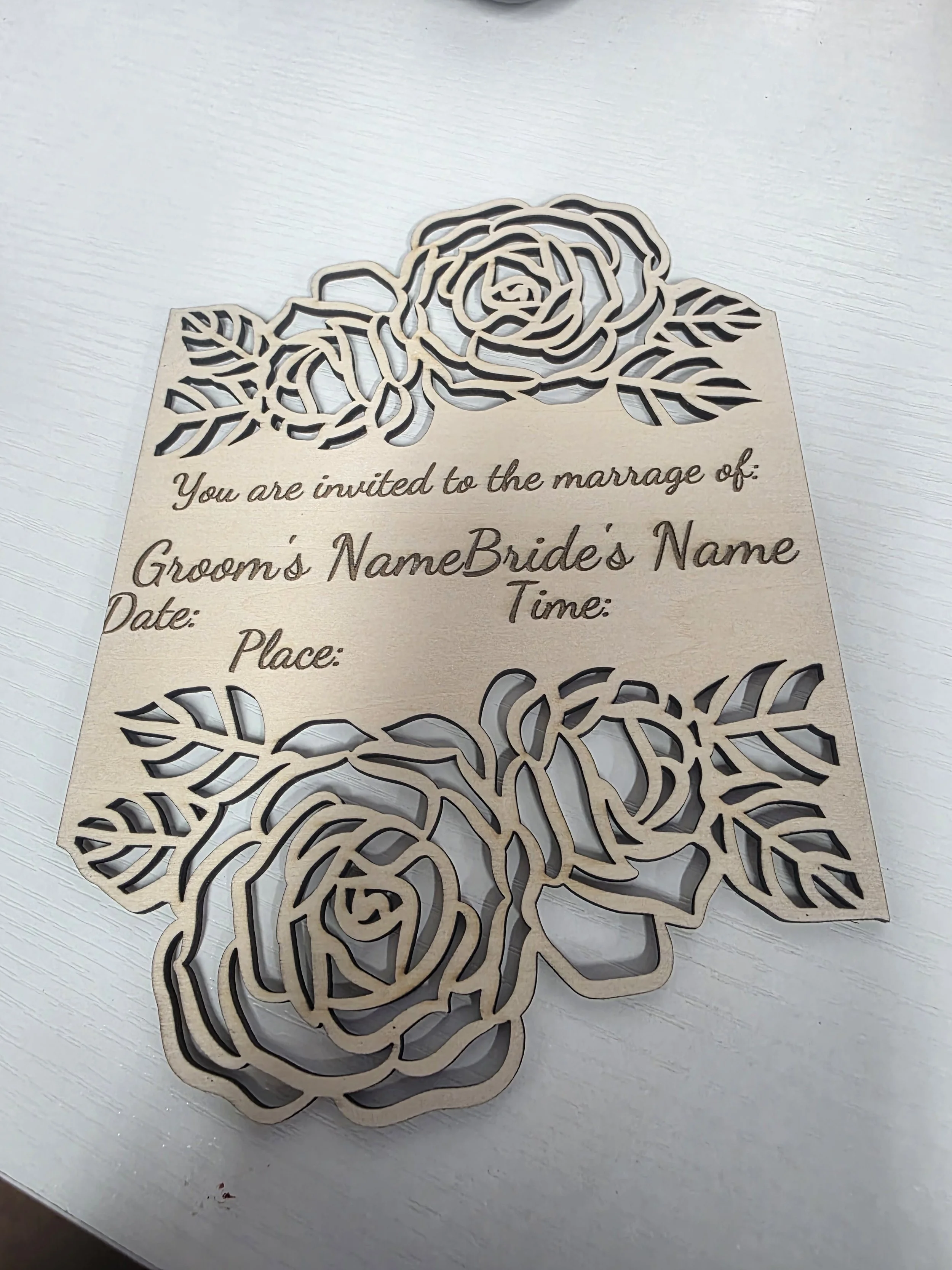 Laser cut wedding invitations roses