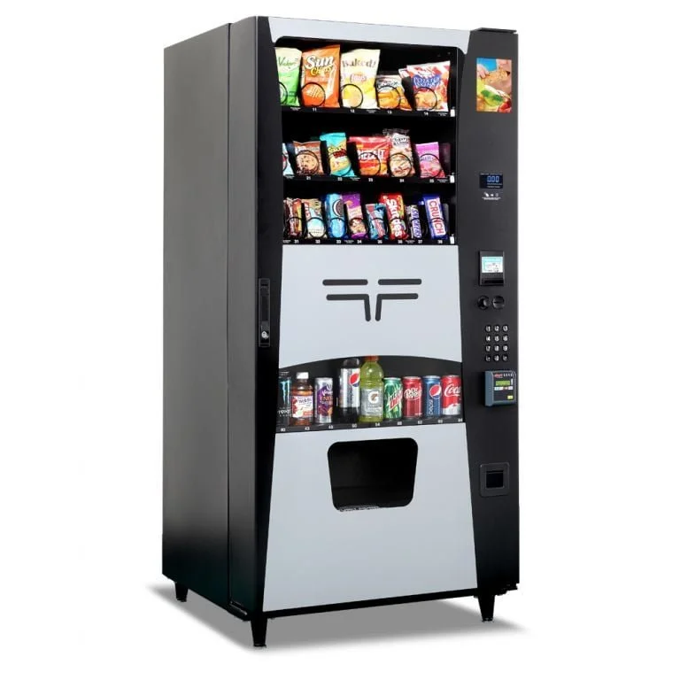 A vending machine stocked with snack foods and drinks.