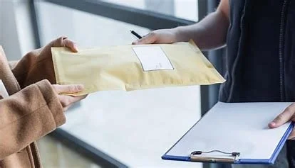 Two people exchanging an envelope — illustrating secure courier and document delivery service to the Arkansas Secretary of State.